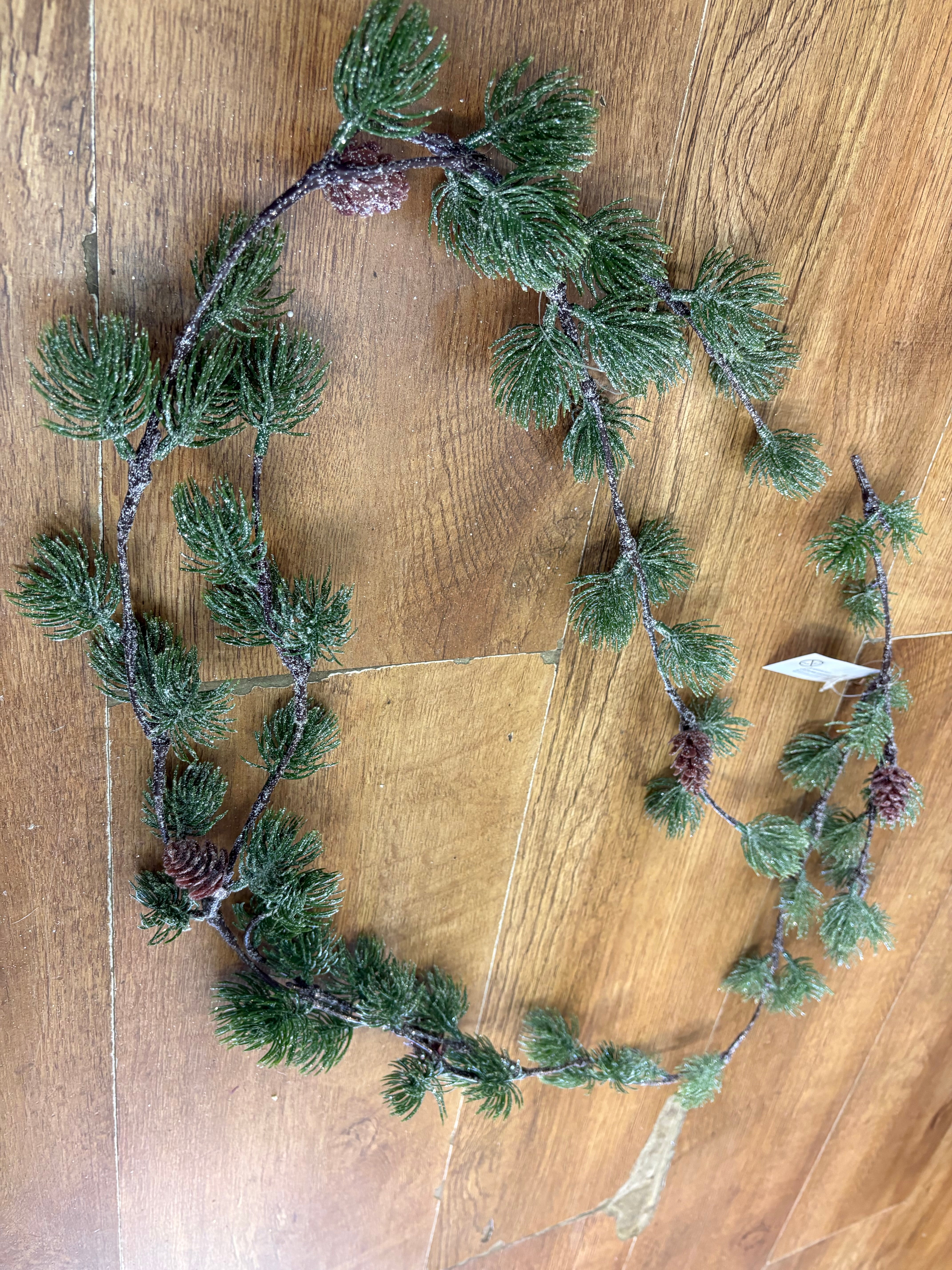 Glittered thistle greenery and miniature cone garland