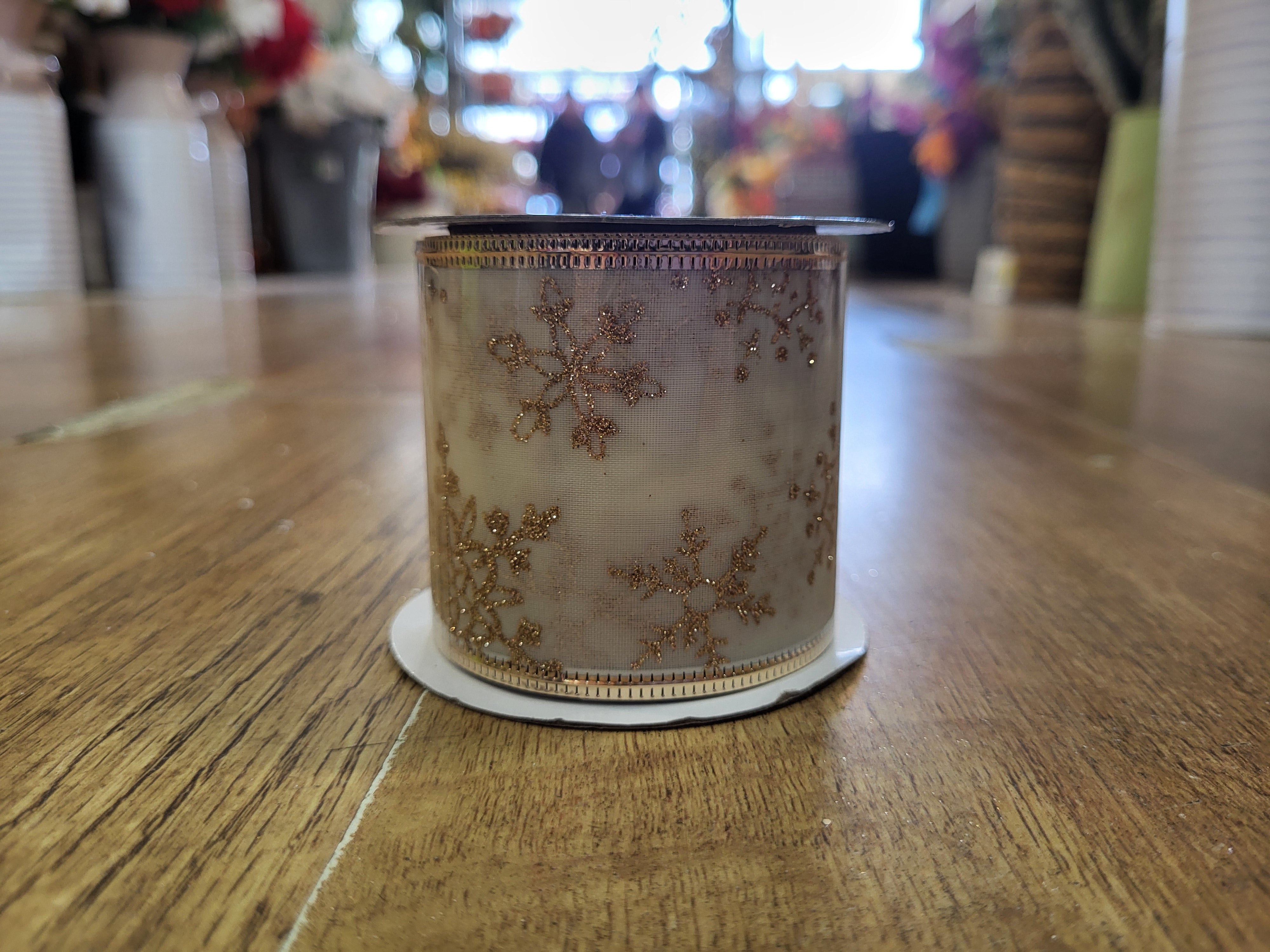 2.7m approx. roll of gold/cream snowflake wired ribbon image 2