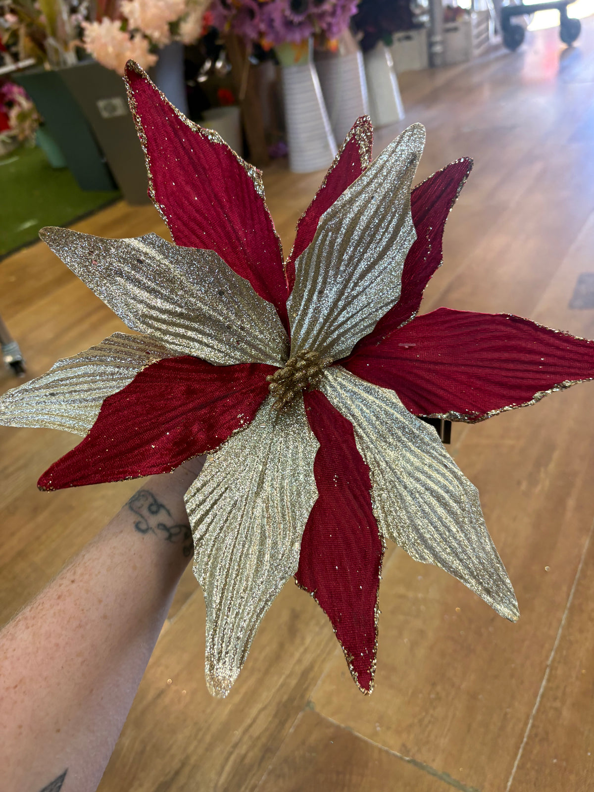Burgundy velvet and metallic champagne poinsettia