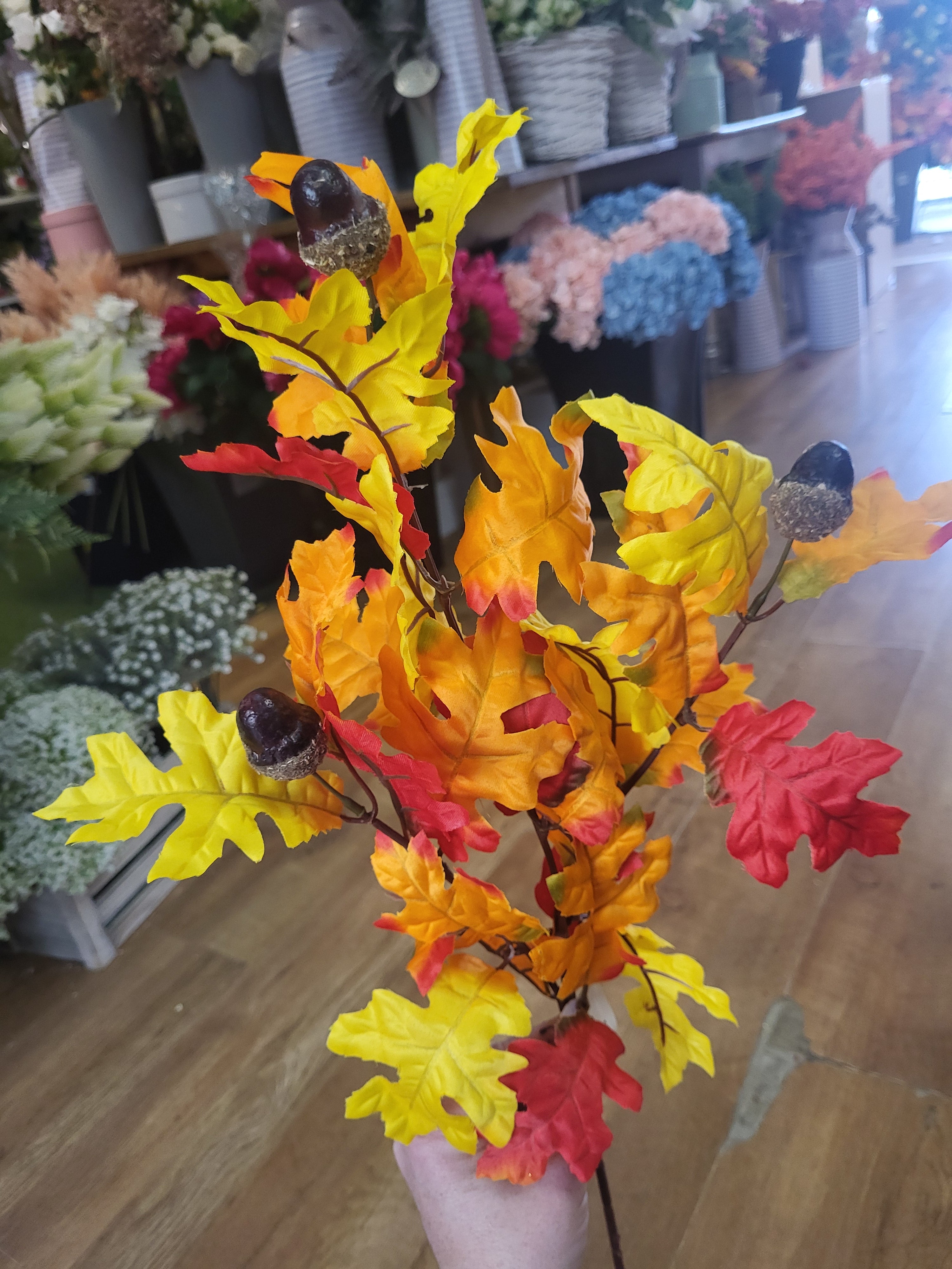 Long stem red/orange/yellow acorn spray image 1