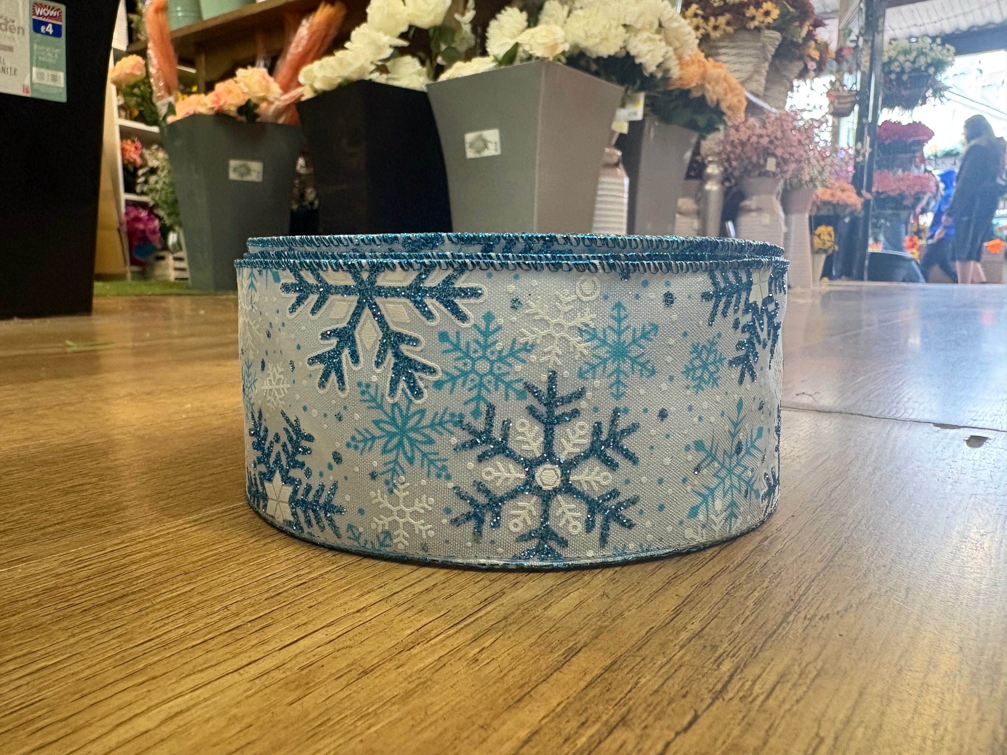 2.5 inch wide glittered blue and white snowflake wired ribbon - 10 metres