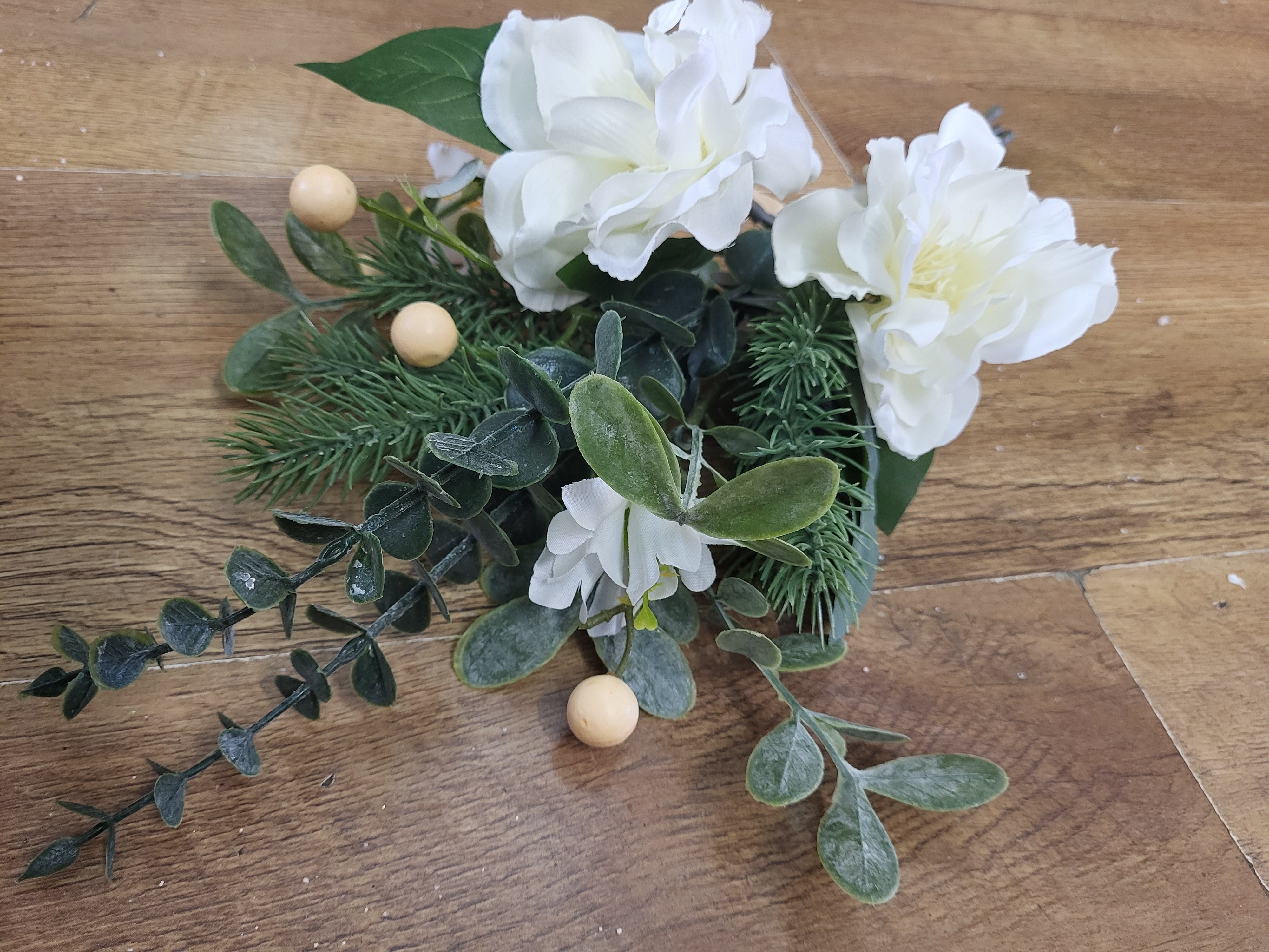 Hand tied winter foliage bundle with ivory flowers and cream berries image 7