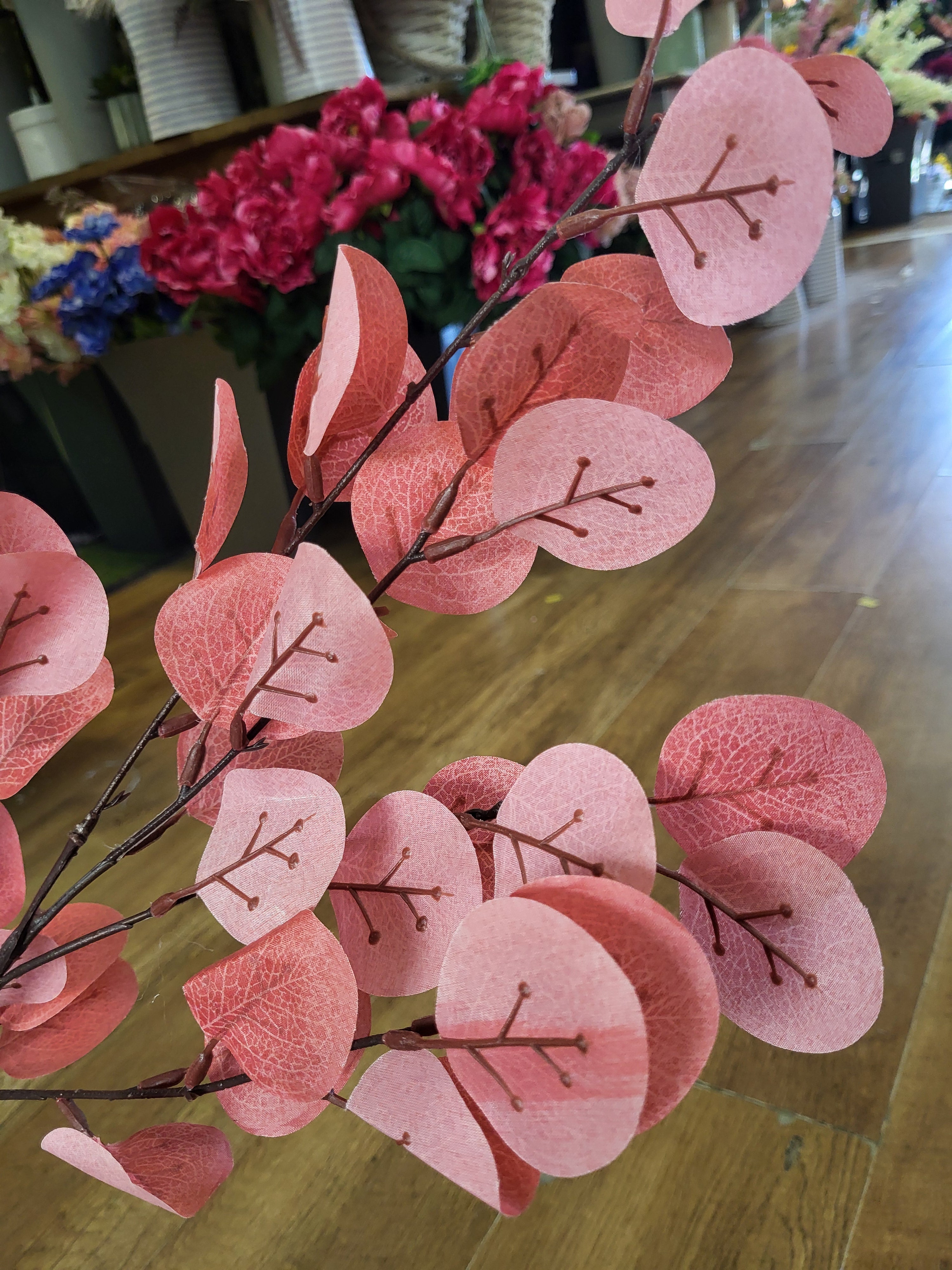 Long stem orangey/red eucalyptus spray image 1