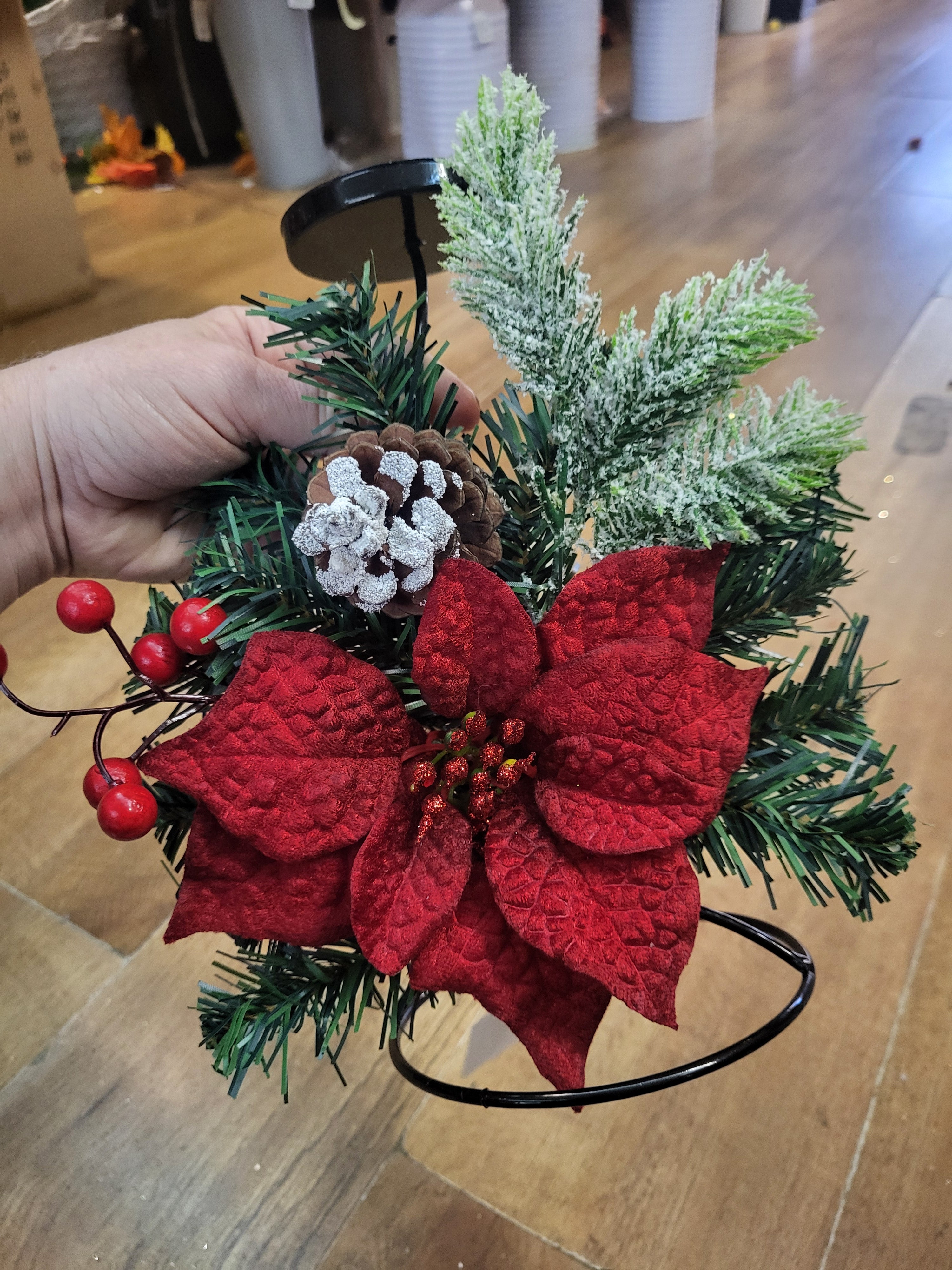 Red poinsettia and snowy foliage decorated metal candle holder image 3
