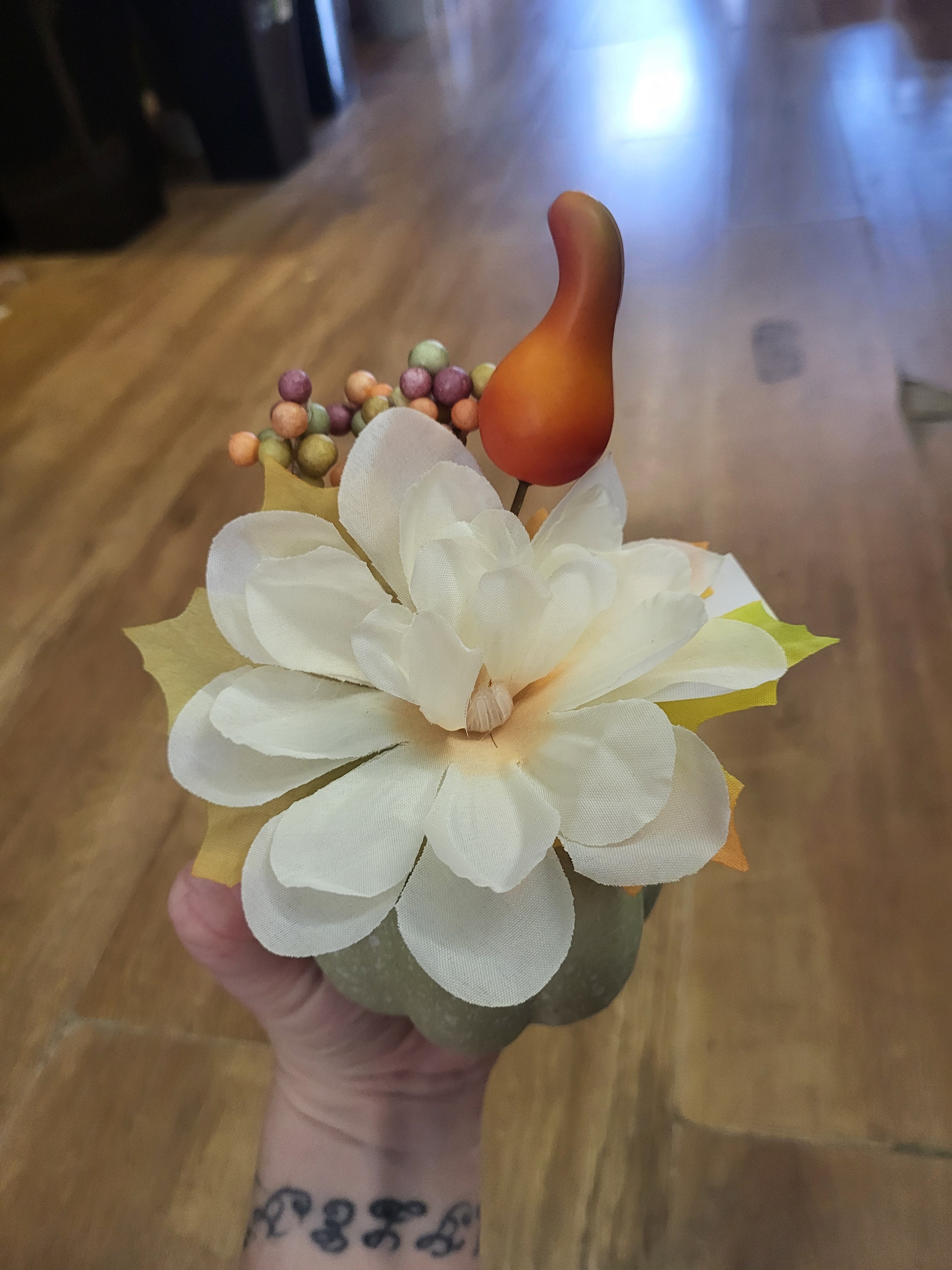 Small decorated pumpkin with cream flower image 1