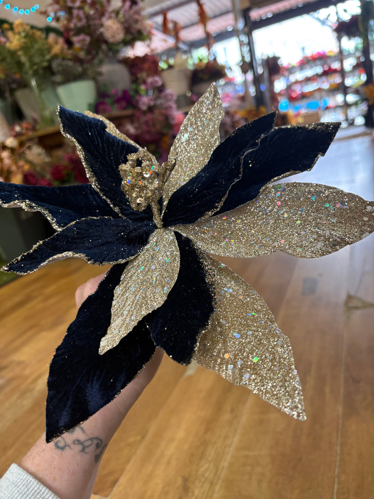 Navy velvet and champagne gold glittered single poinsettia