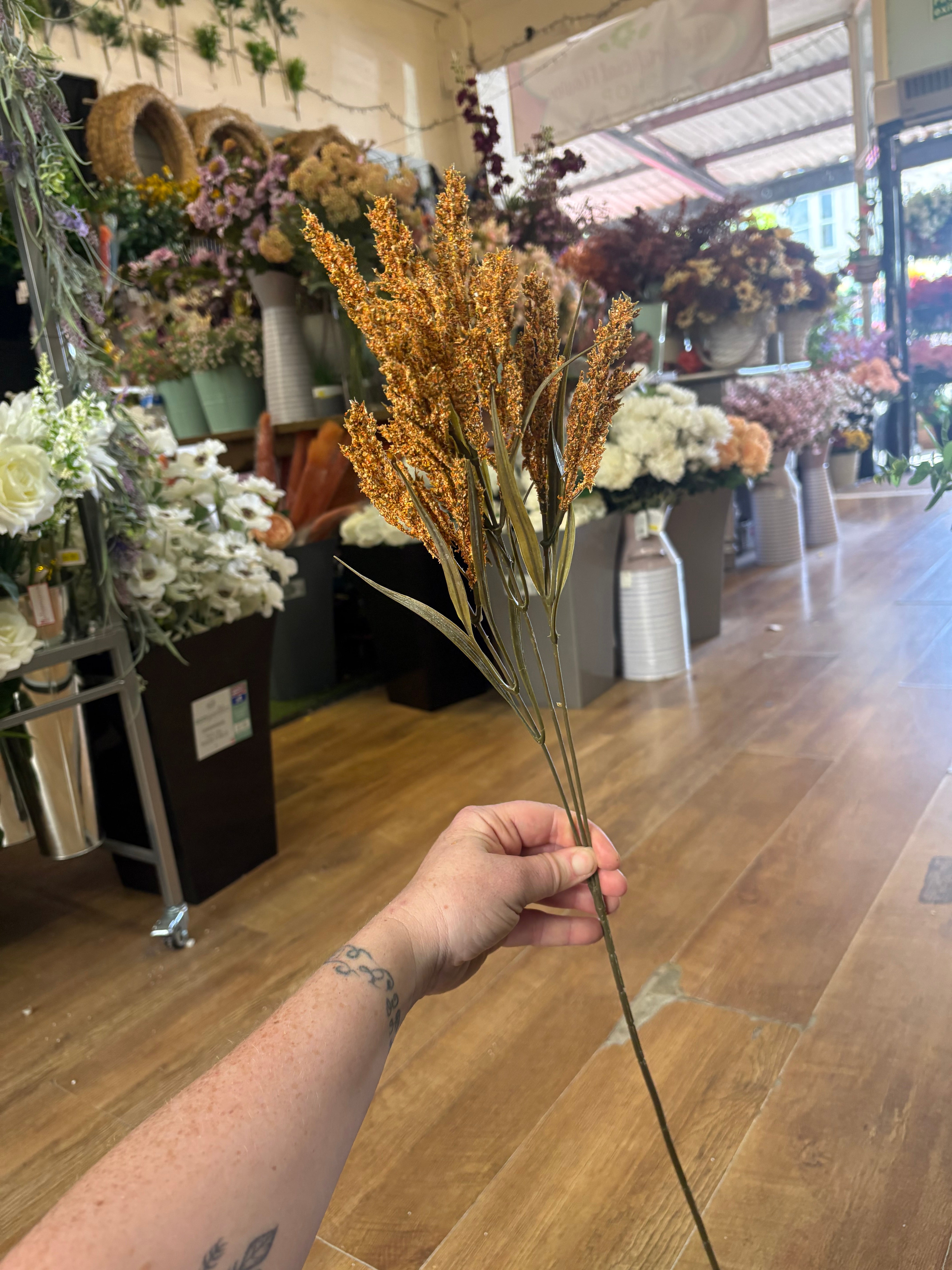 Long stem orange autumn heather spray