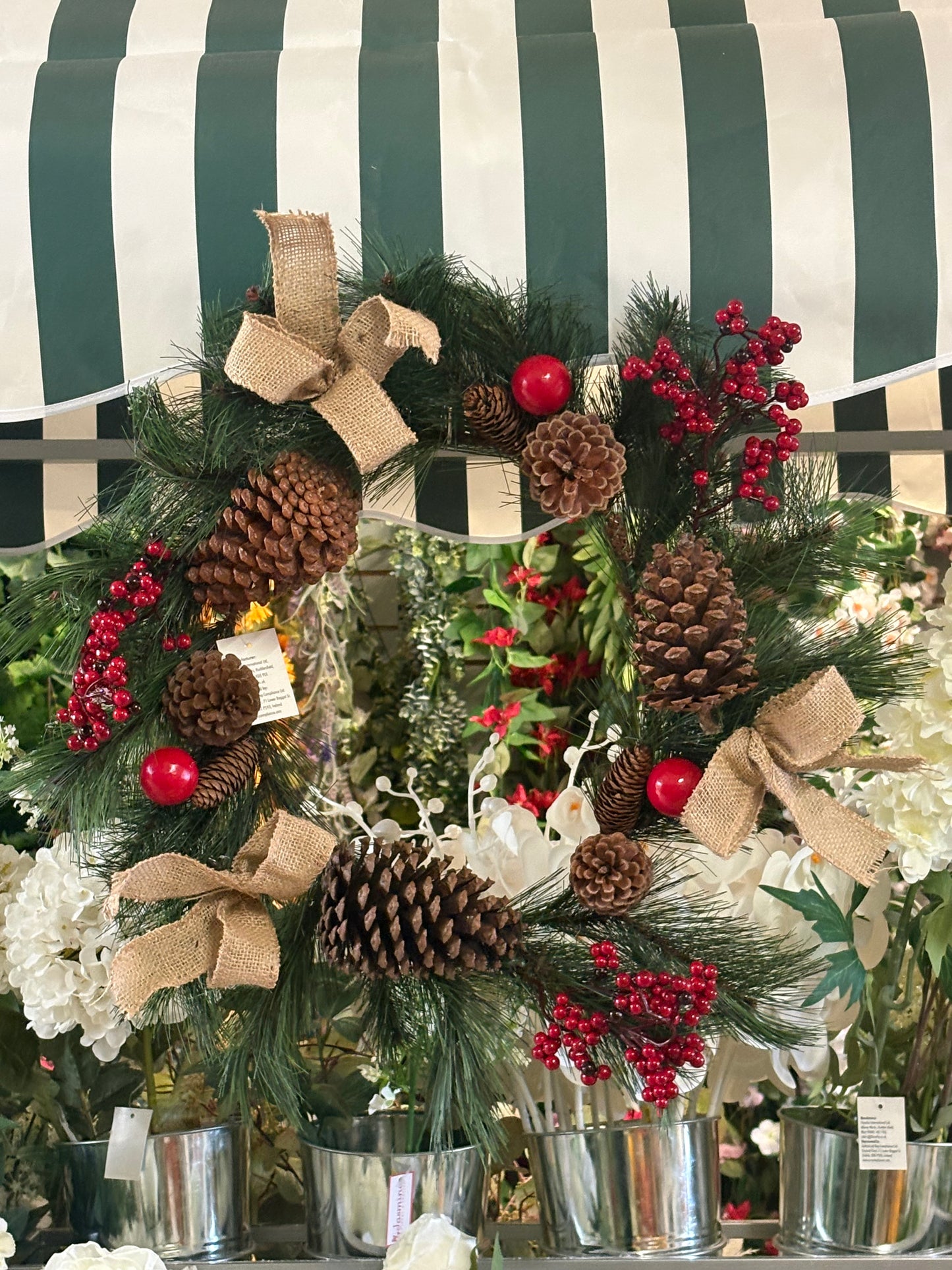 Red berry, cone and bow wreath (55cm from tip to tip)