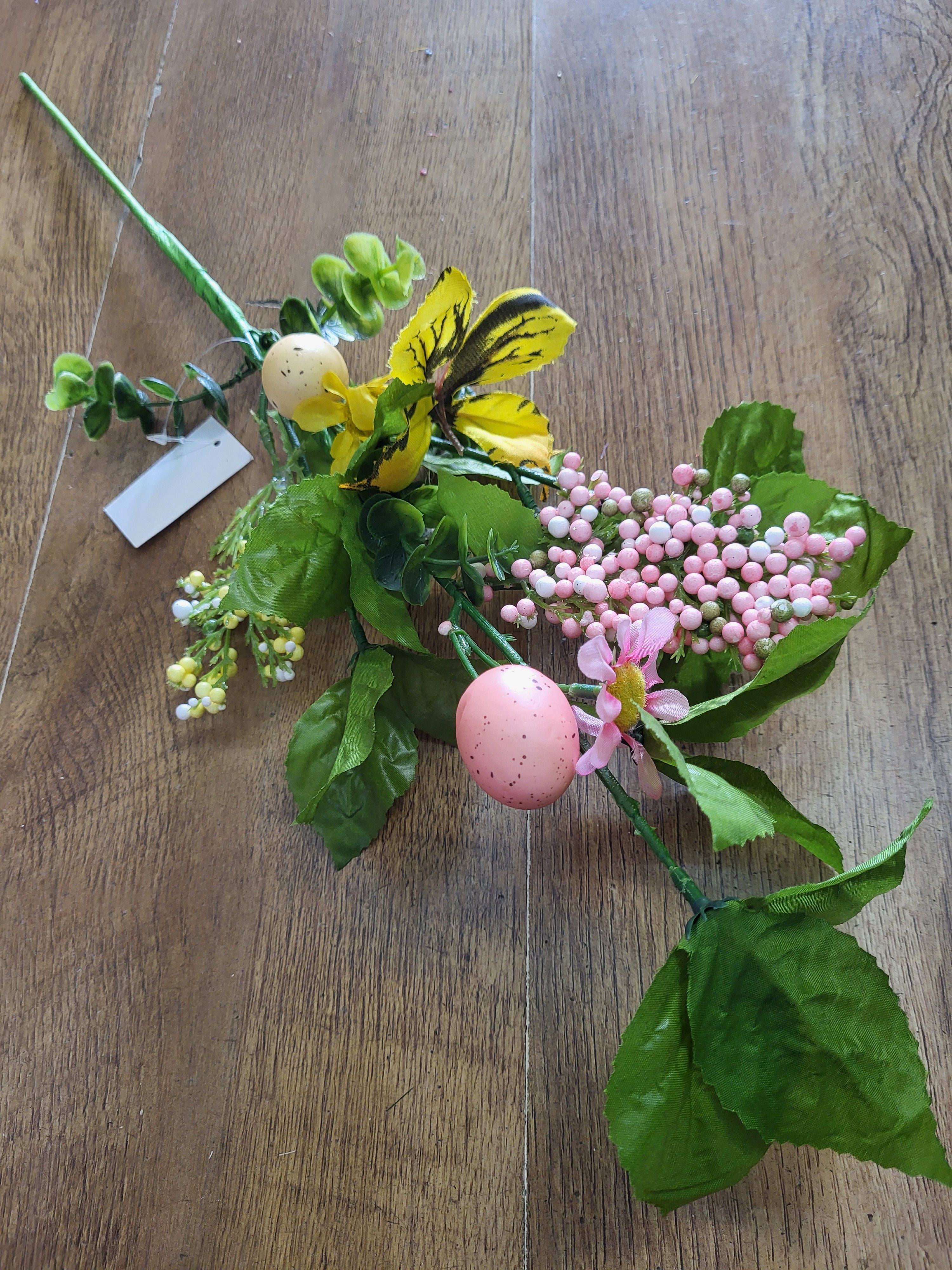 Pink and yellow Easter egg spray with foliage/berries image 0