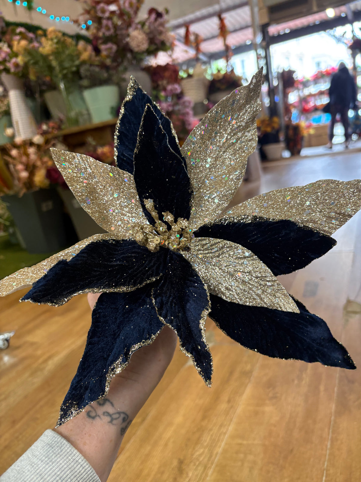 Navy velvet and champagne gold glittered single poinsettia