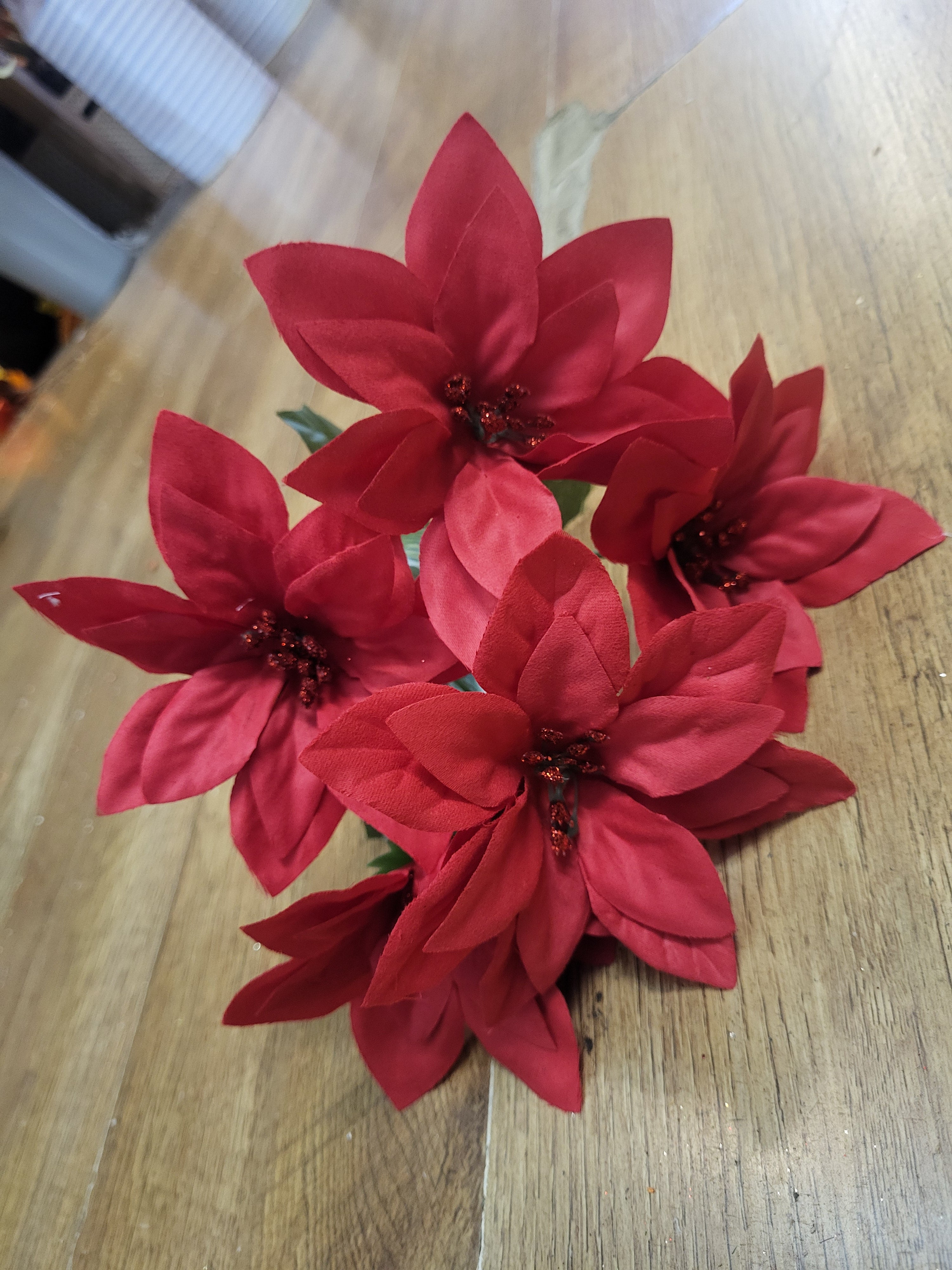 Glittered centre red poinsettia bunch image 0