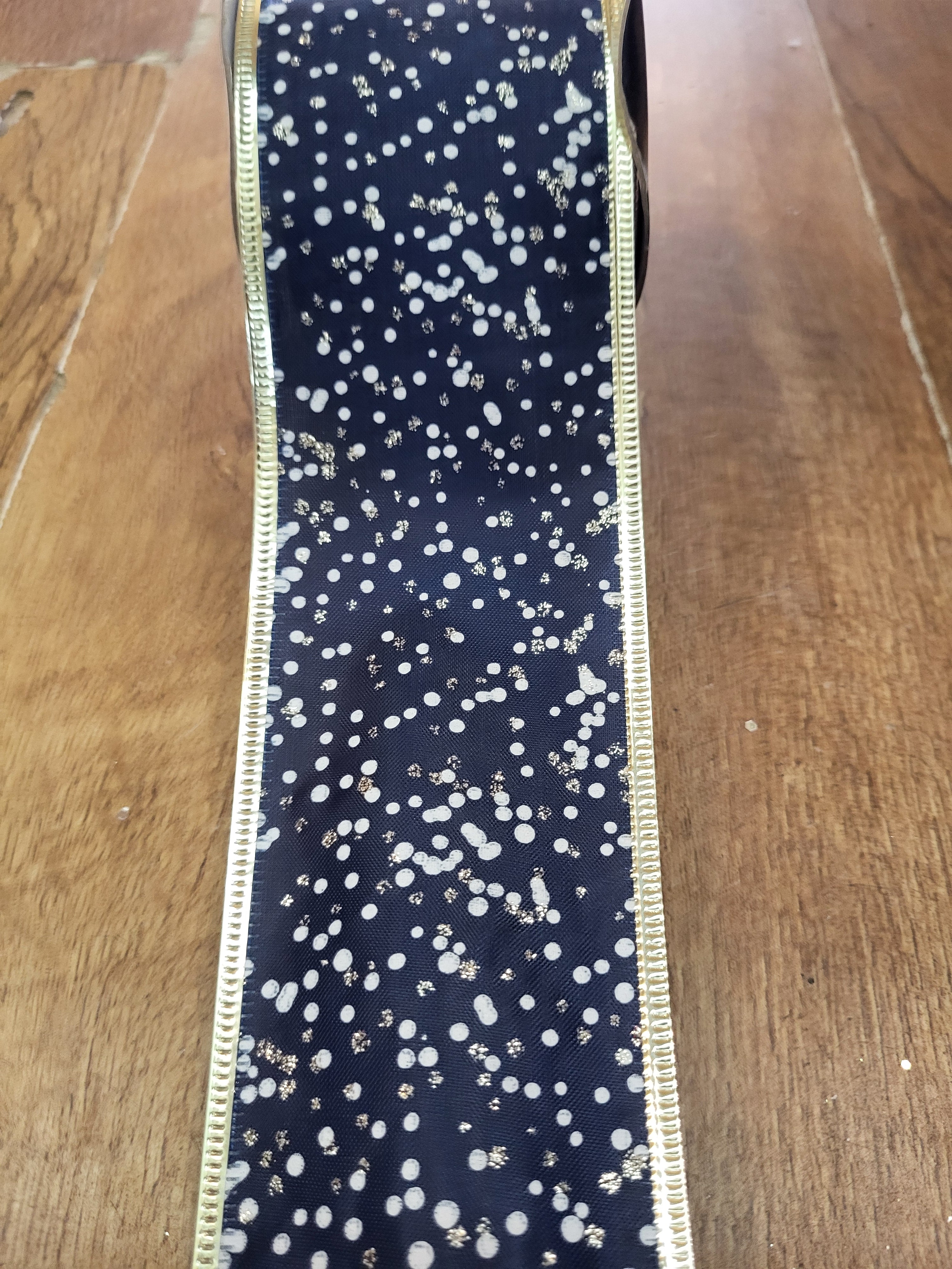 2.7m approx. roll of navy/champagne gold glitter/white spotted wired ribbon image 0