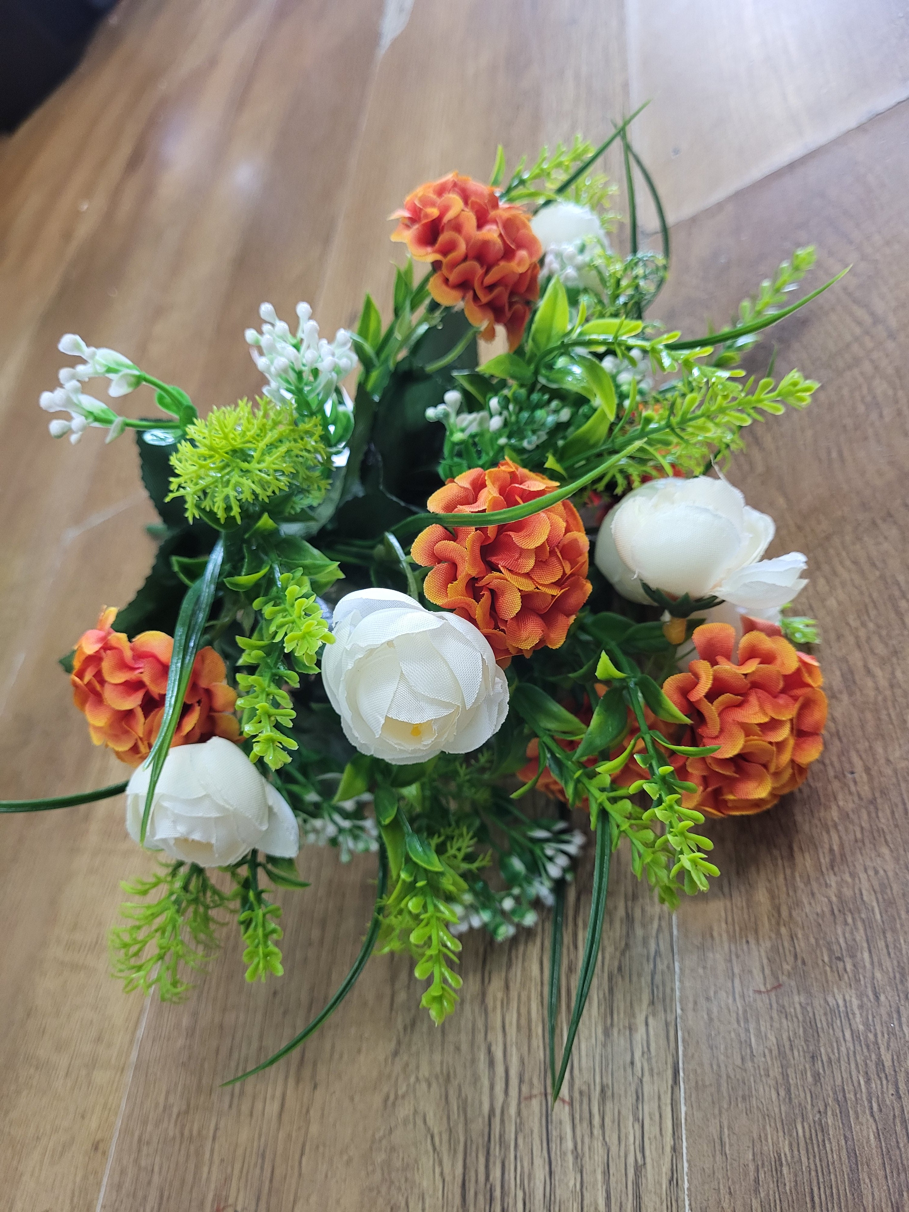 Ivory and orange mini ranunculus and pom bunch image 0