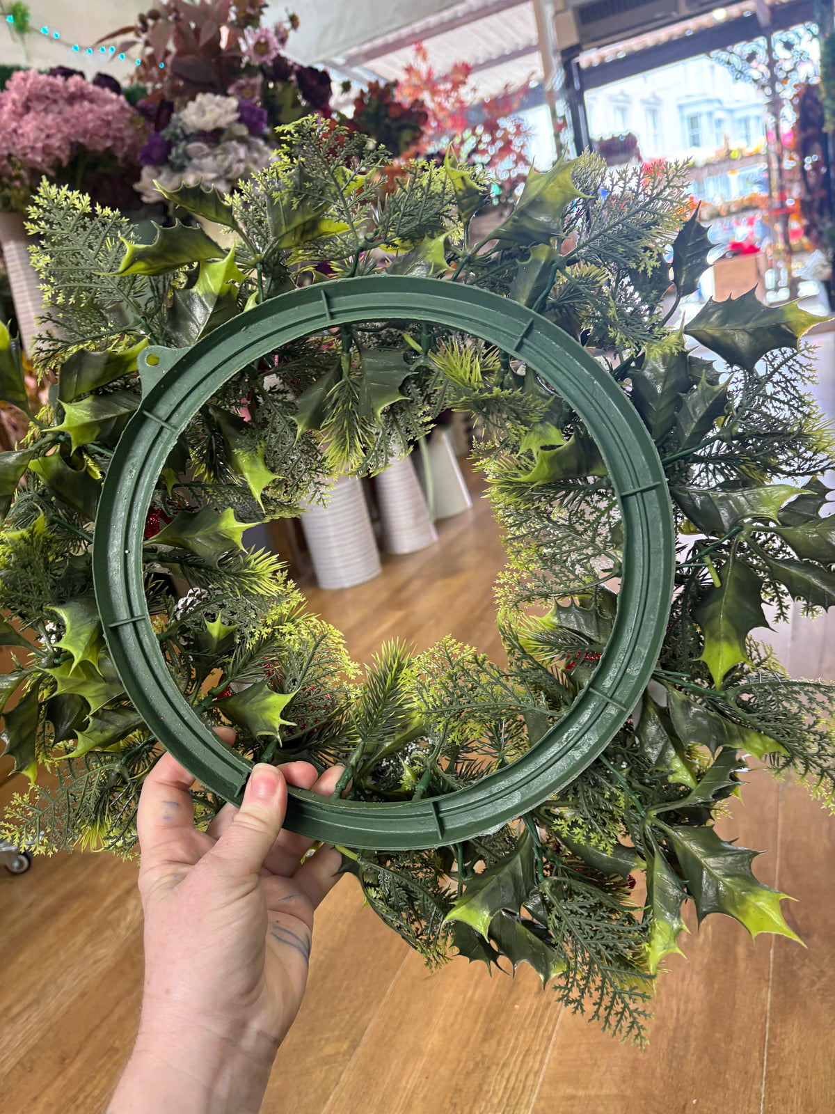 18” wreath with candy baubles, swirls and cones