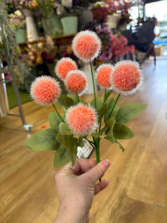 Orange fluffy balls bunch