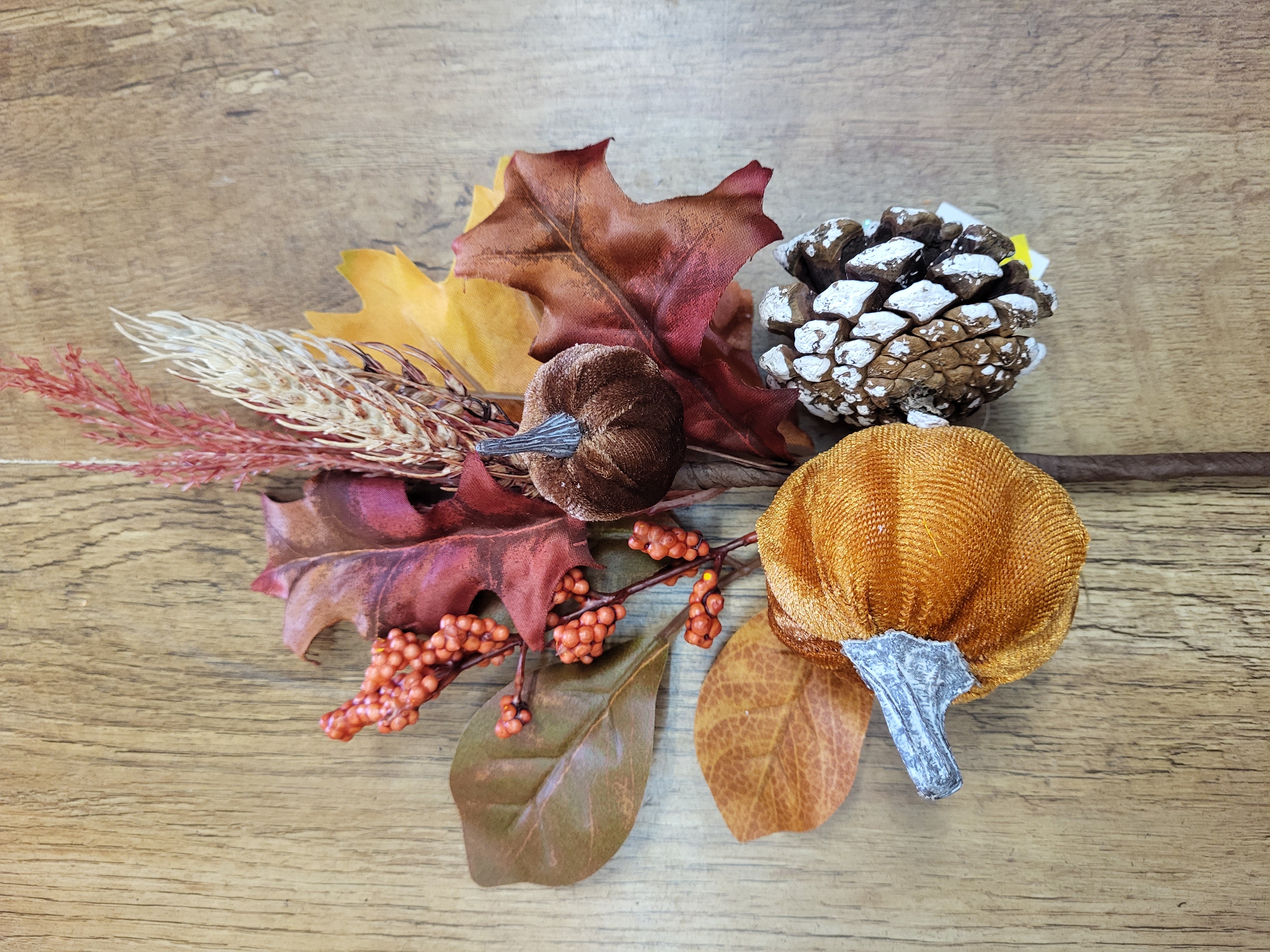 Velvet pumpkin, cones and mixed autumnal foliage branch image 2