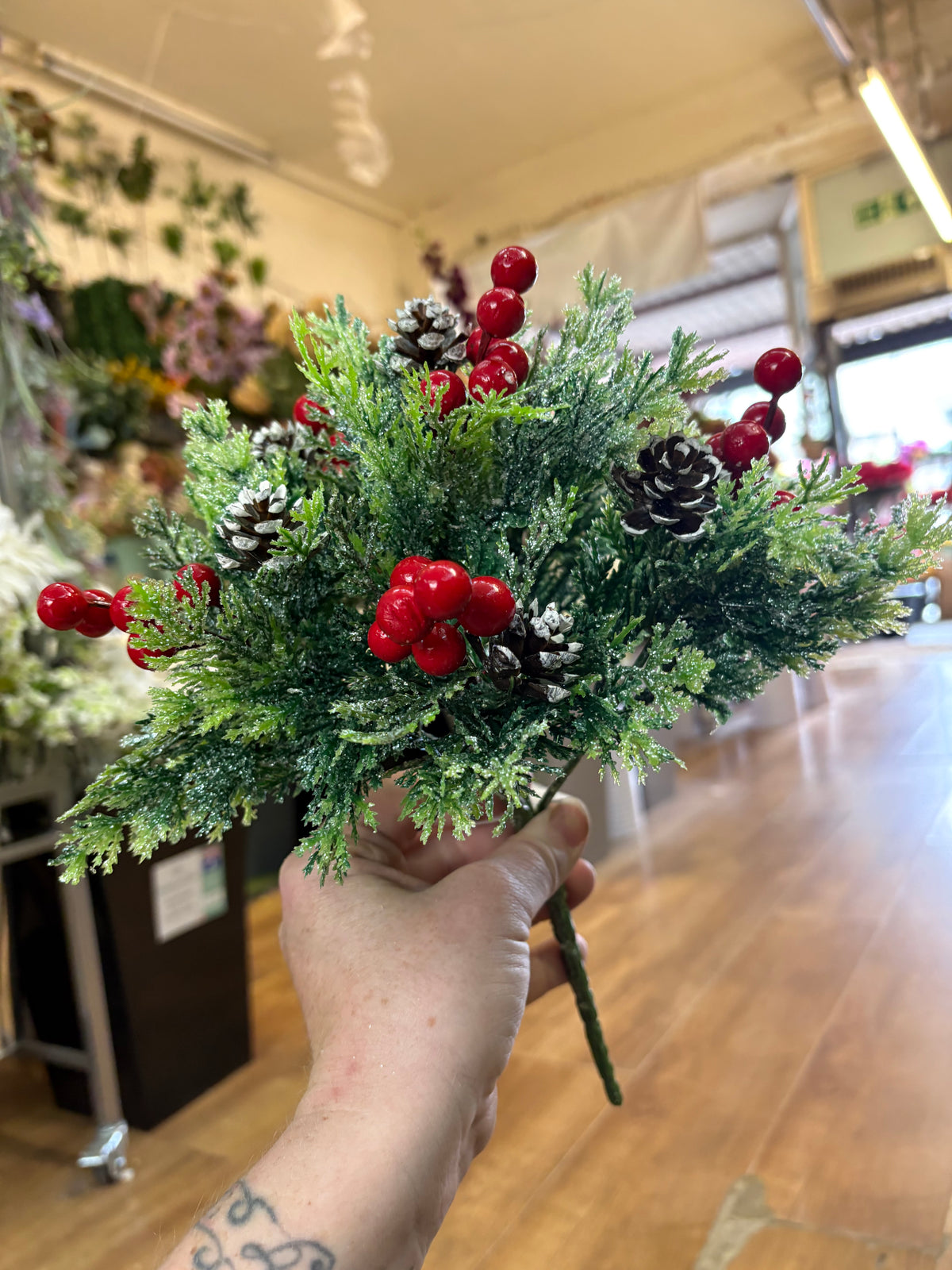 6 stemmed glittered foliage, miniature cone and red berry bunch