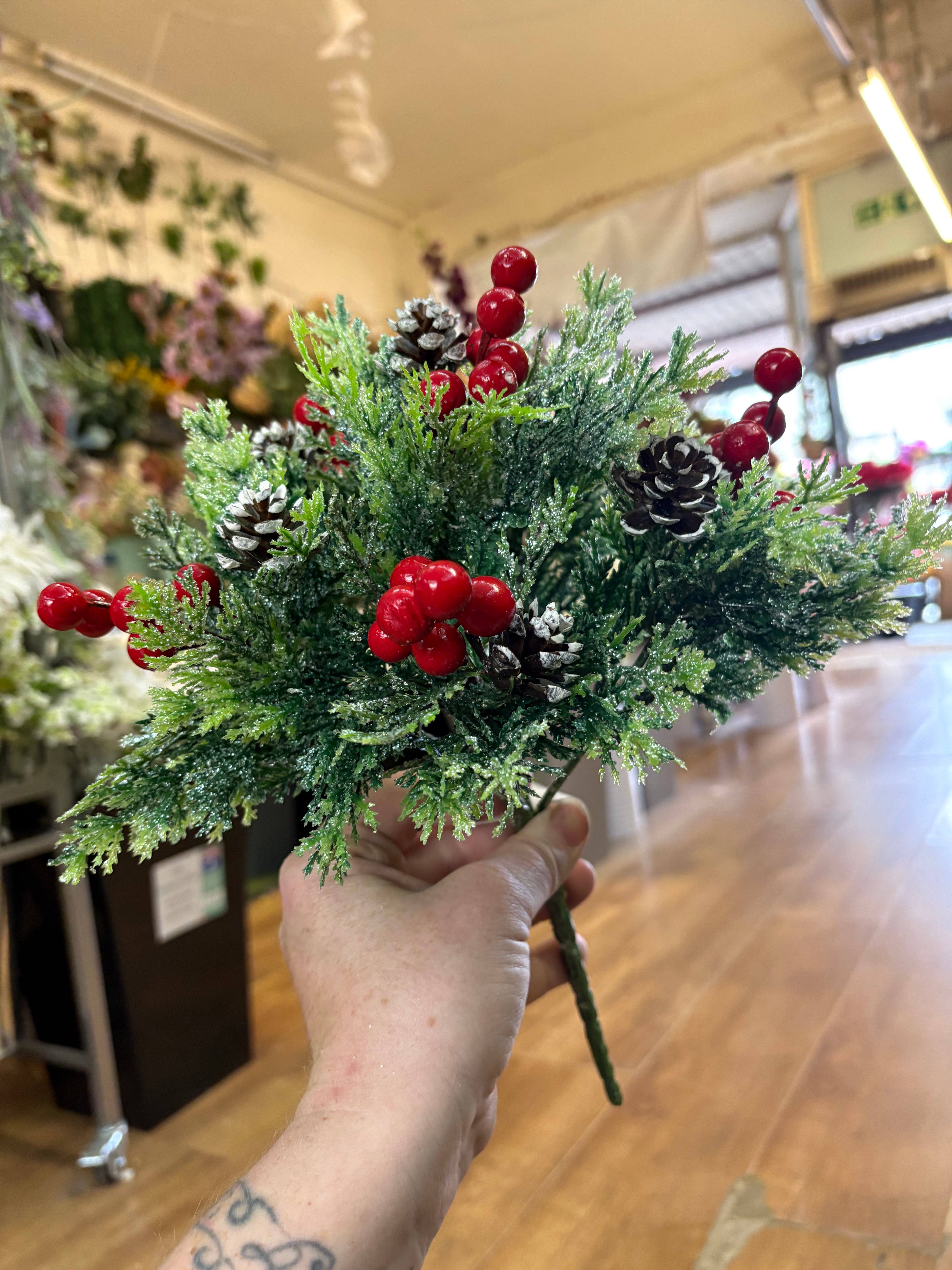 6 stemmed glittered foliage, miniature cone and red berry bunch