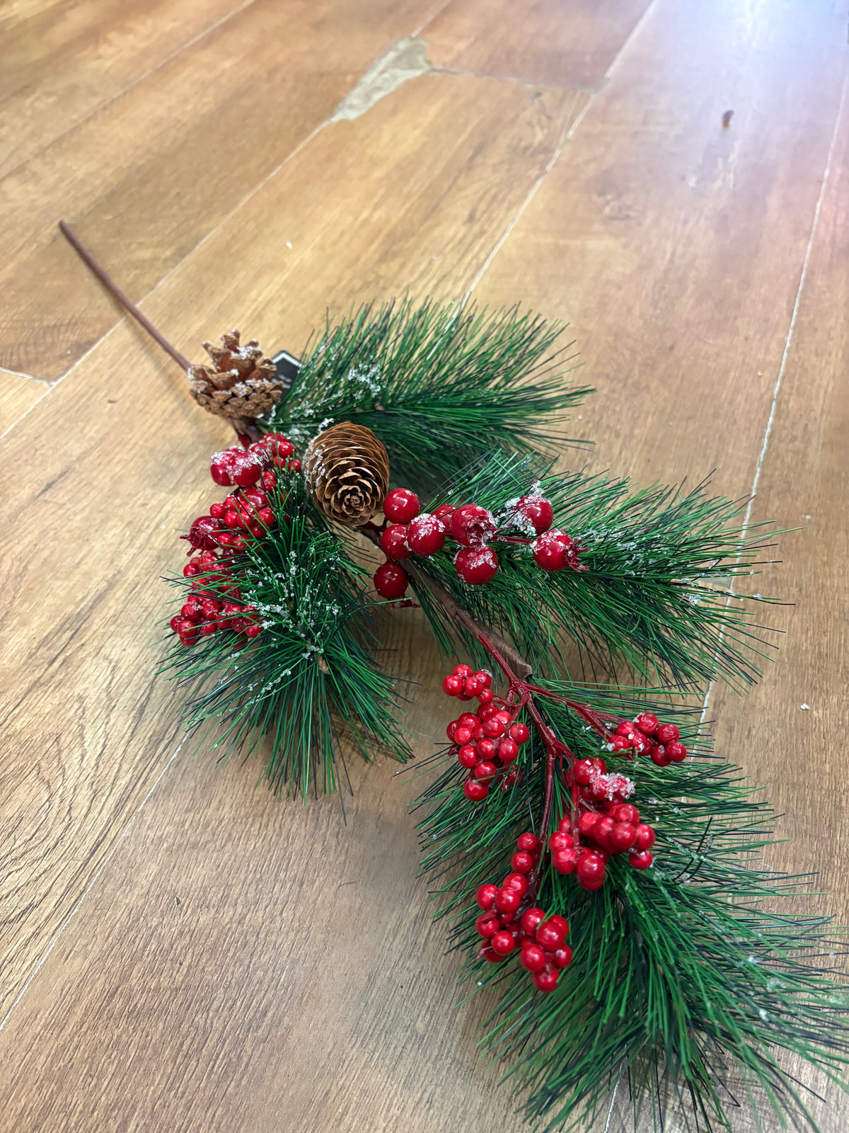 Long stem frosted foliage wi5 cones and mixed berries