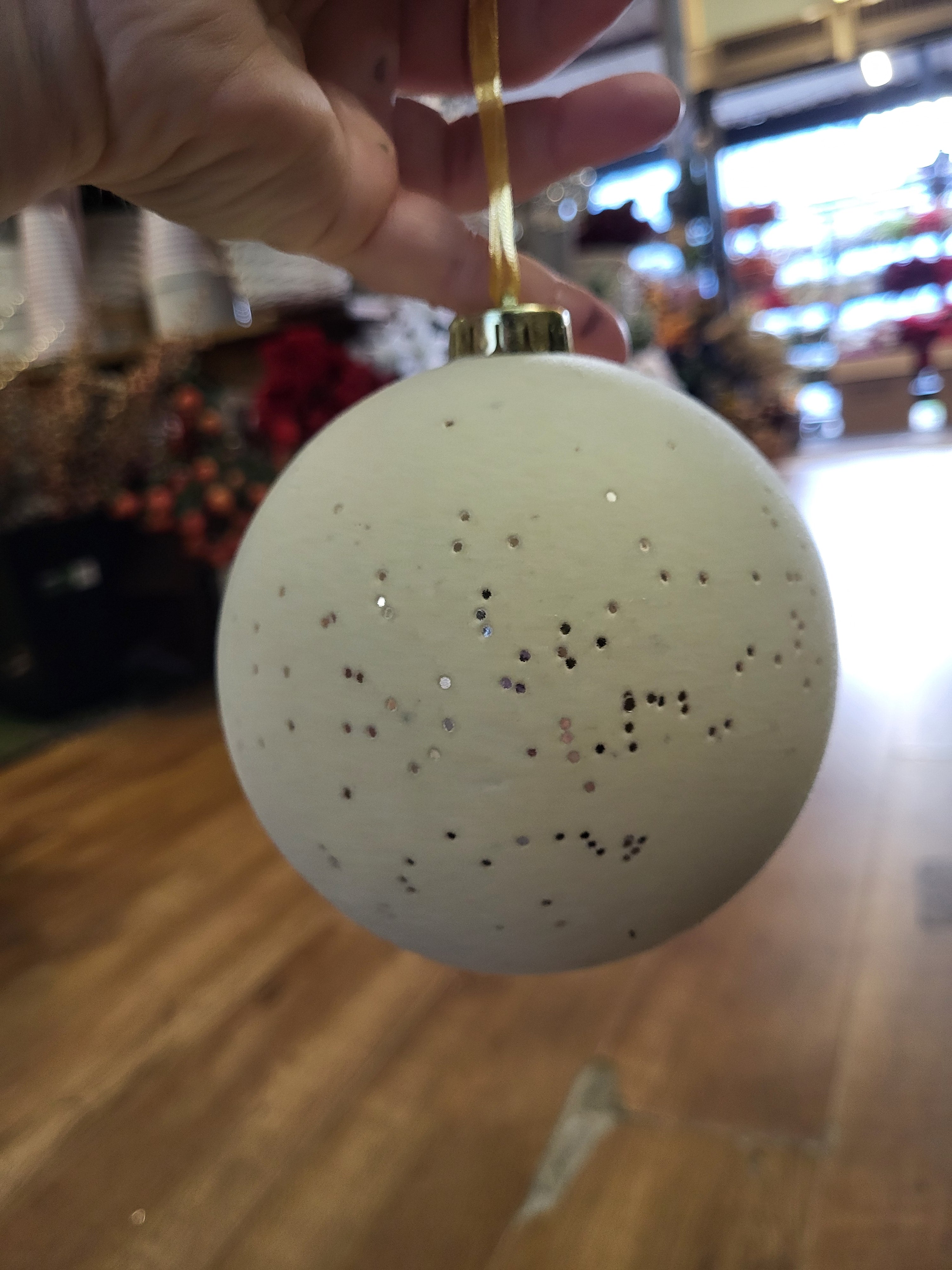 12cm flocked cream bauble with metallic flecks image 0