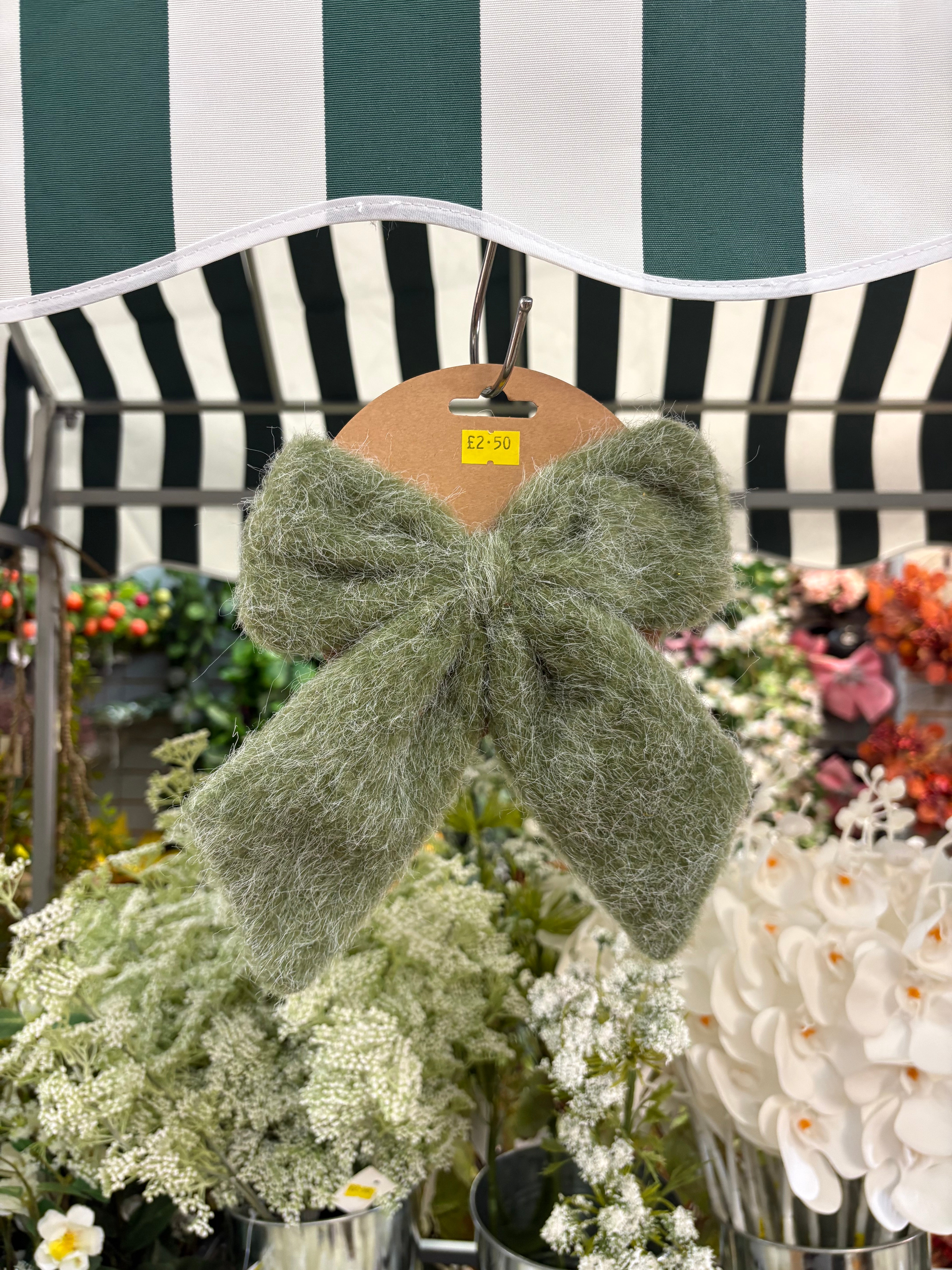 Small green fleece Christmas bow