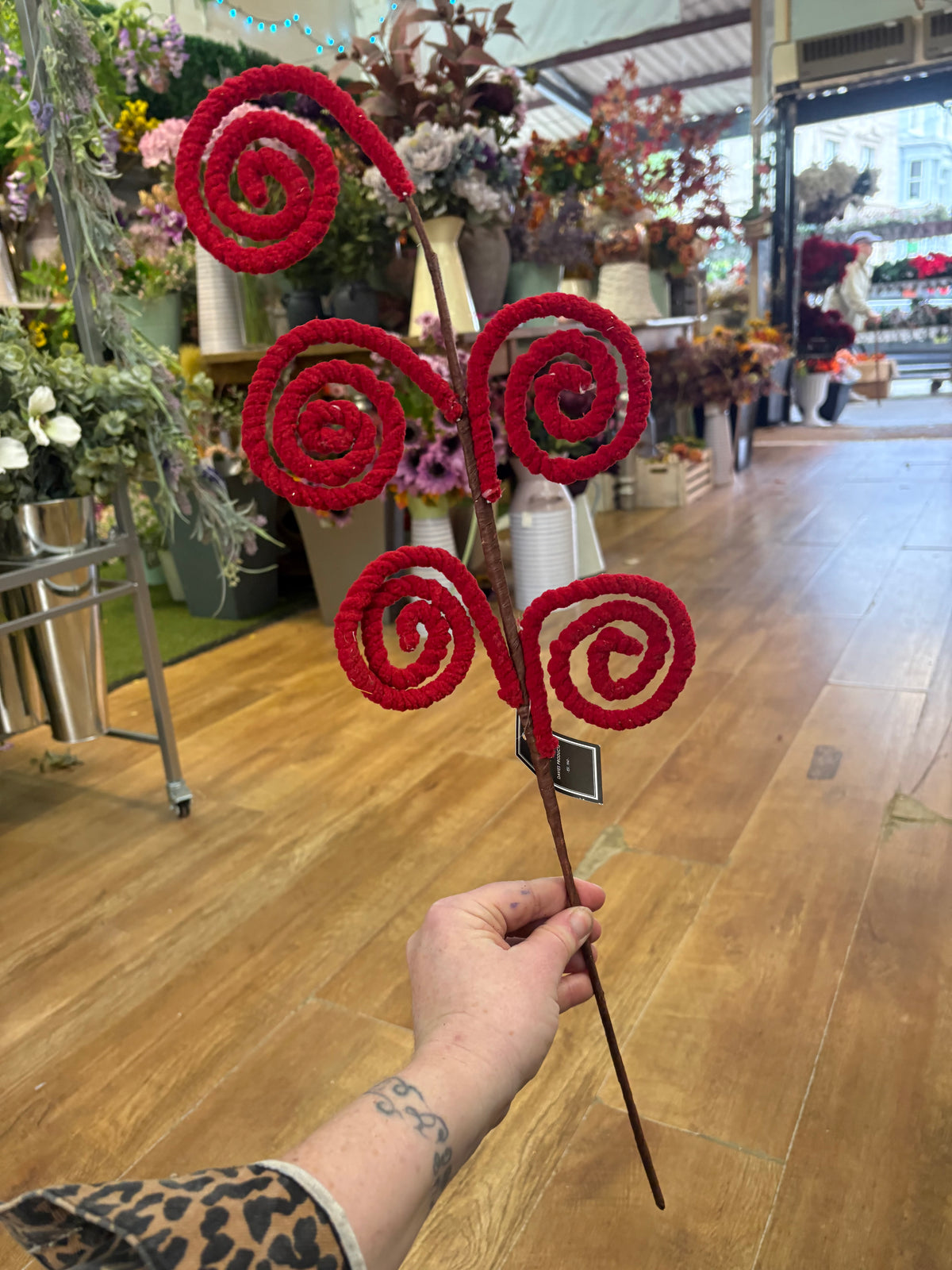 Long stem fluffy red swirly stem