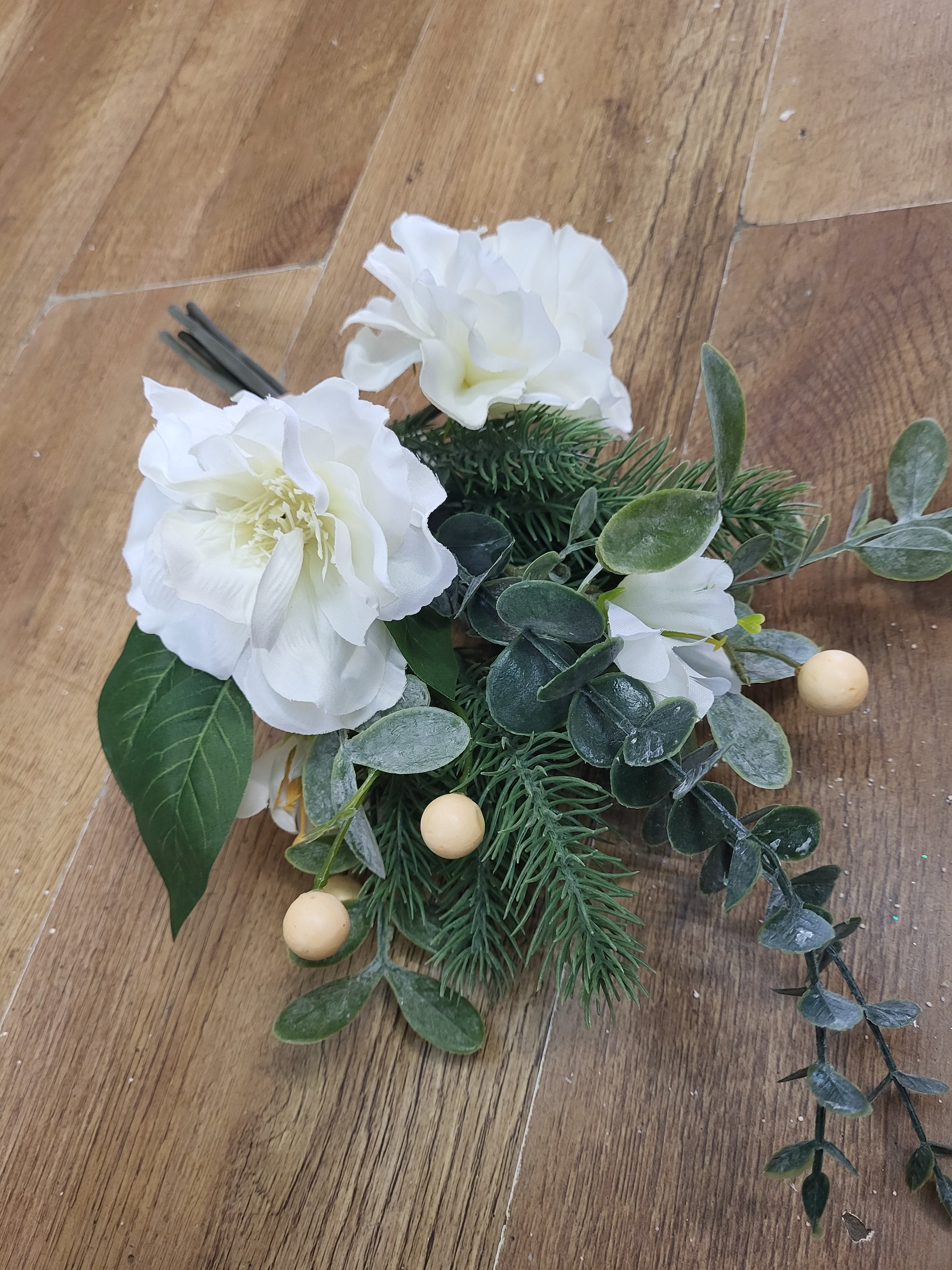 Hand tied winter foliage bundle with ivory flowers and cream berries image 2