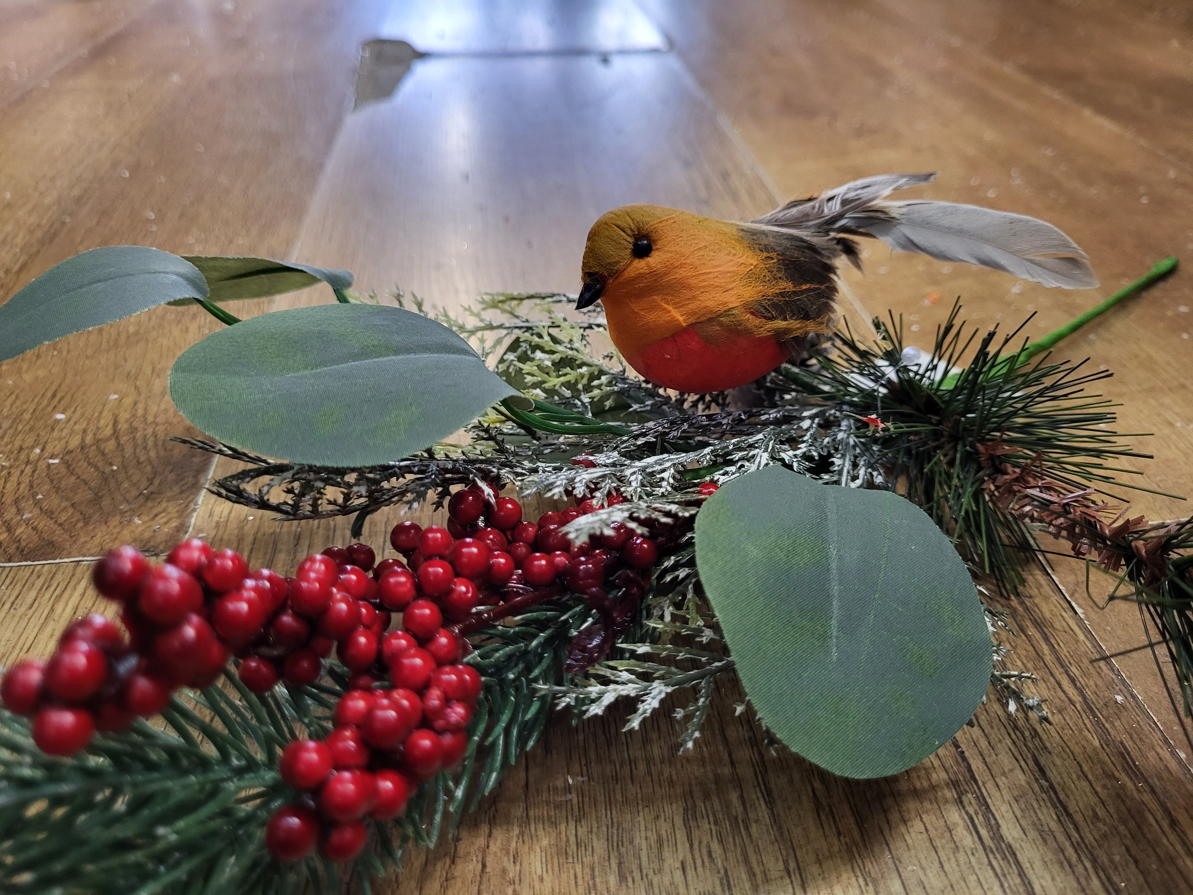 Mixed winter foliage and berry branch with a Robin image 5