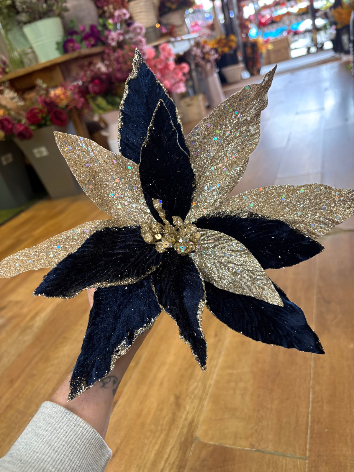 Navy velvet and champagne gold glittered single poinsettia