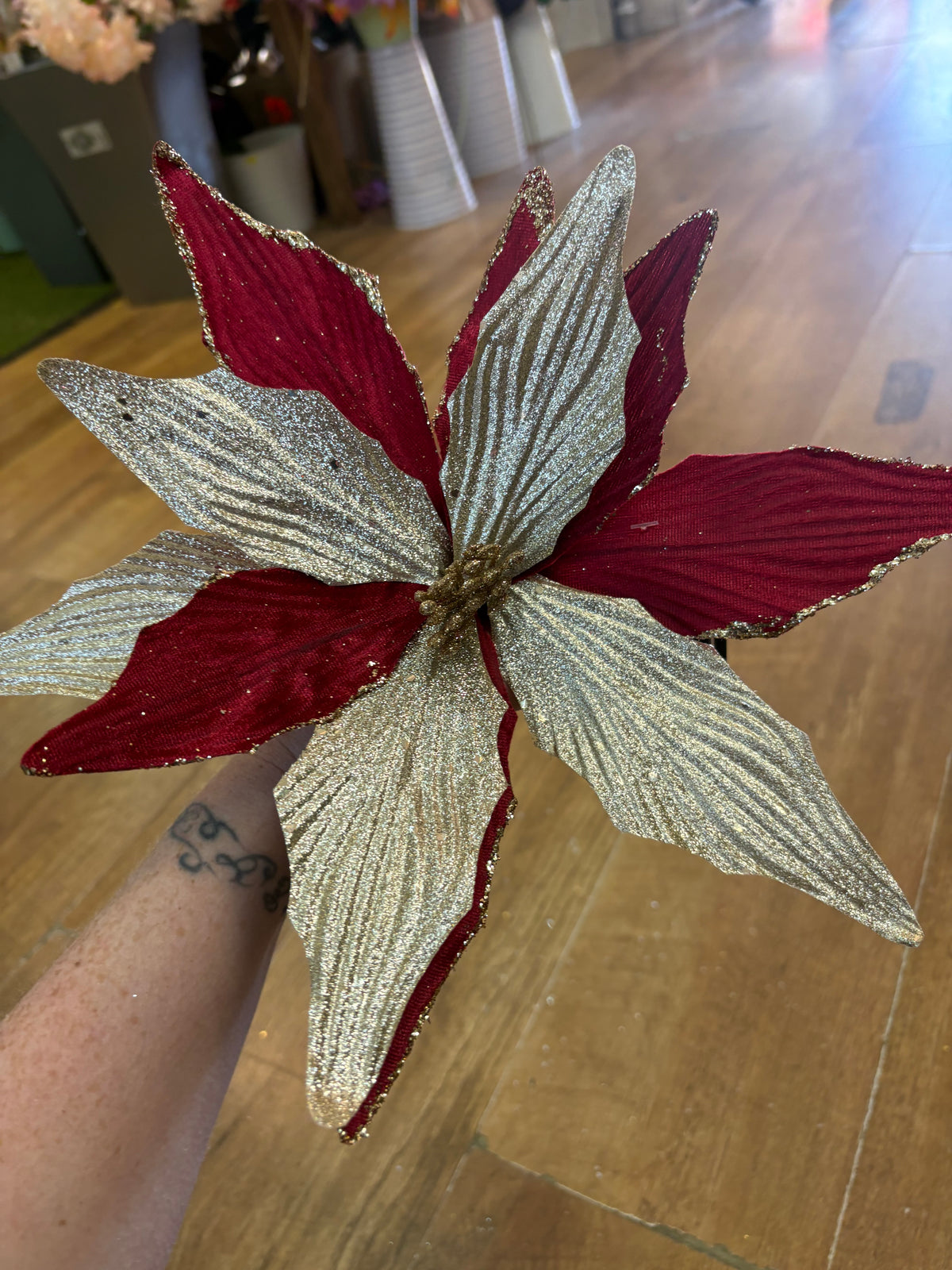 Burgundy velvet and metallic champagne poinsettia