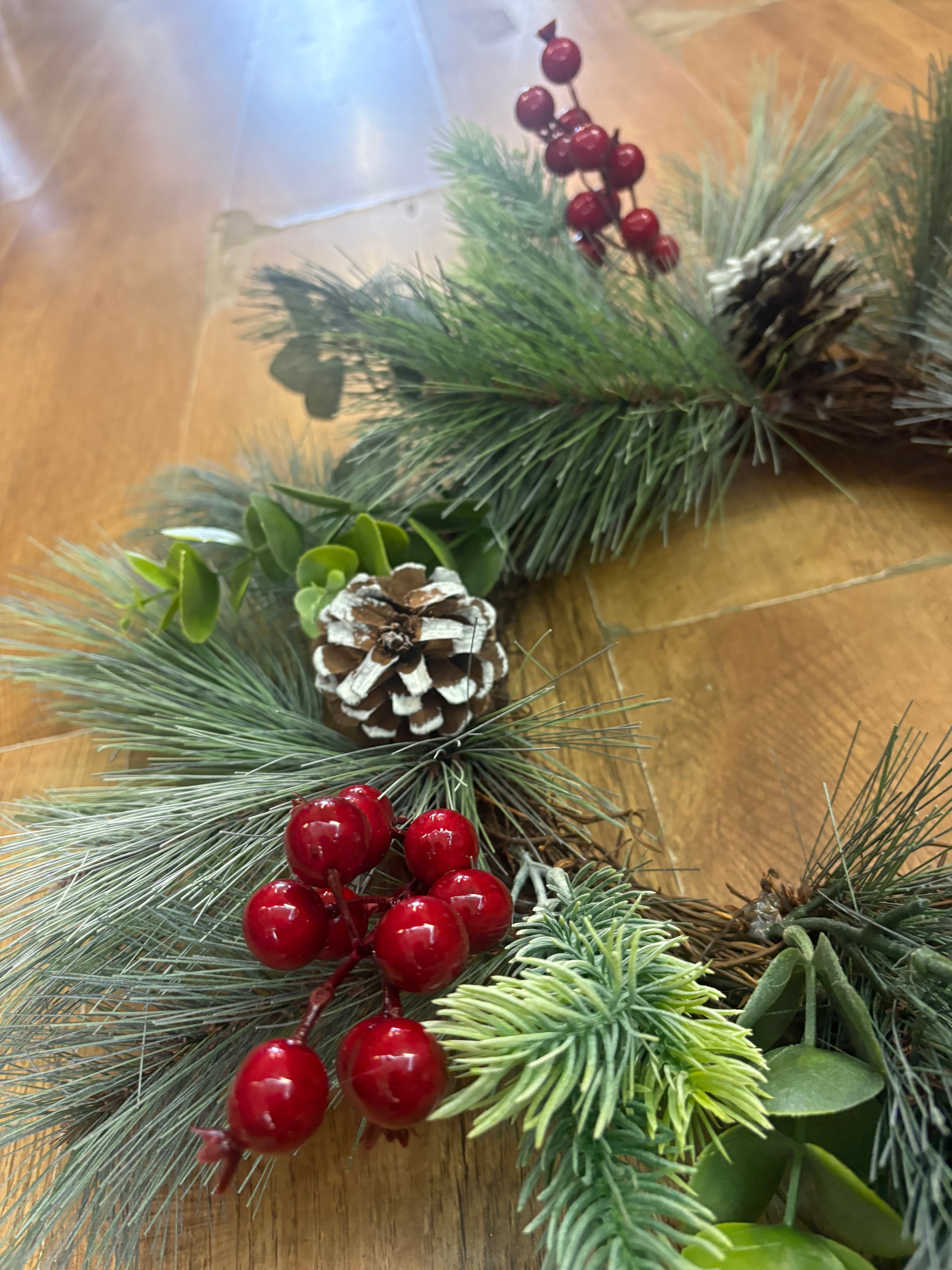 50cm frosted cone and berry wreath (measured tip to tip)