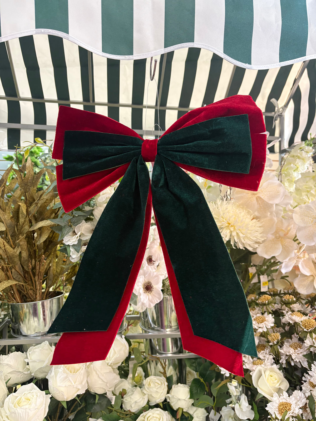 Large red and emerald green velvet Christmas bow