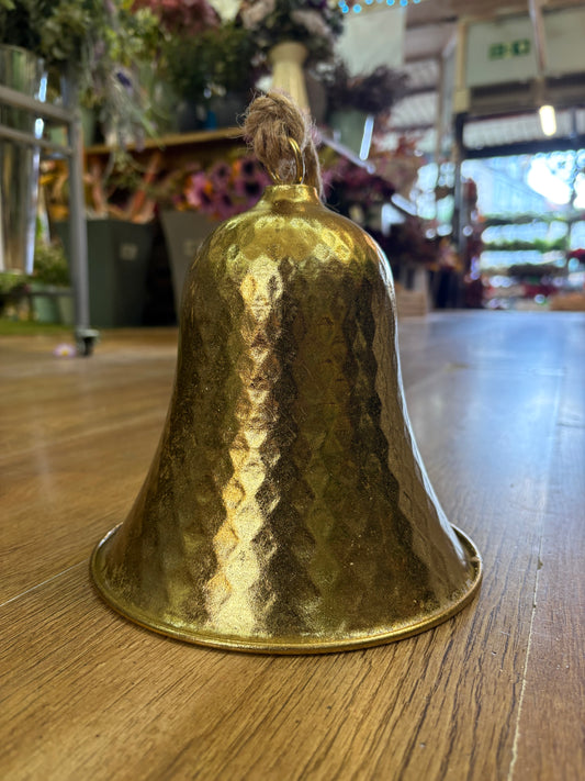 Embossed gold metal hanging bell on a rope (18x22 - Measurement of bell only)