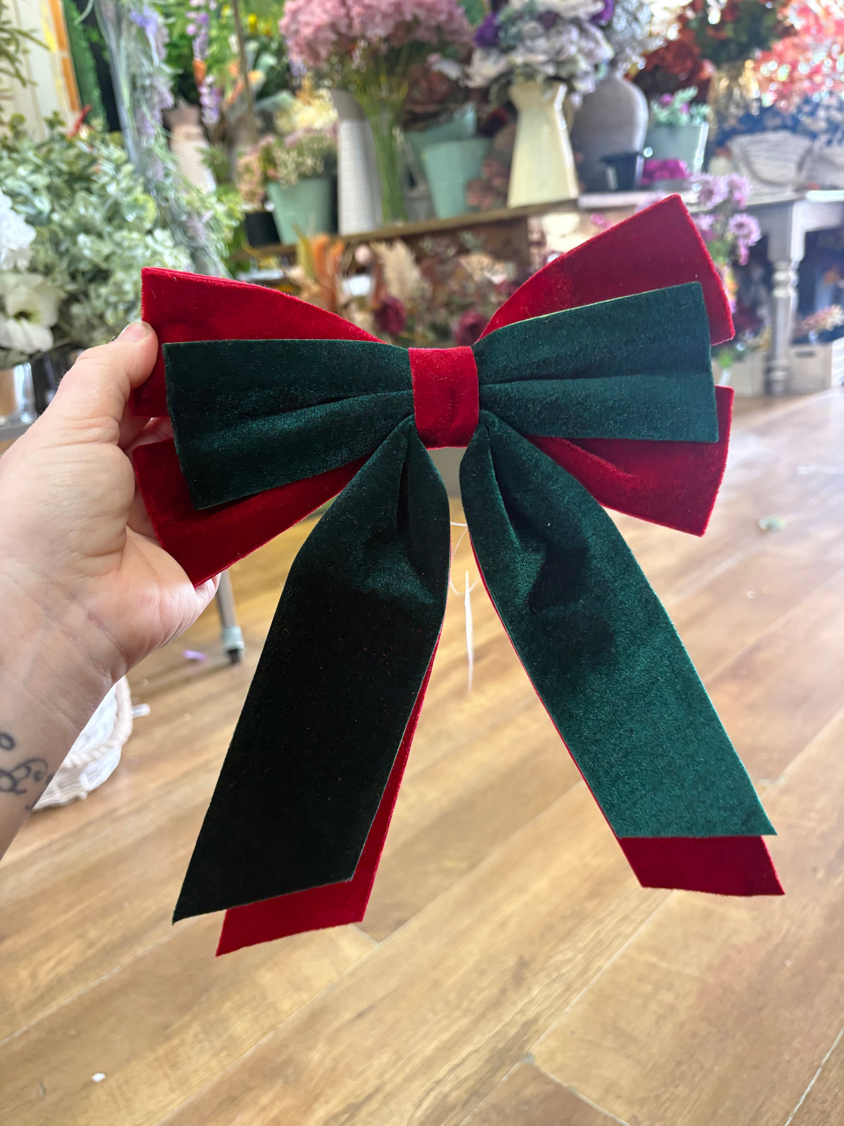 Small red and emerald green velvet Christmas bow