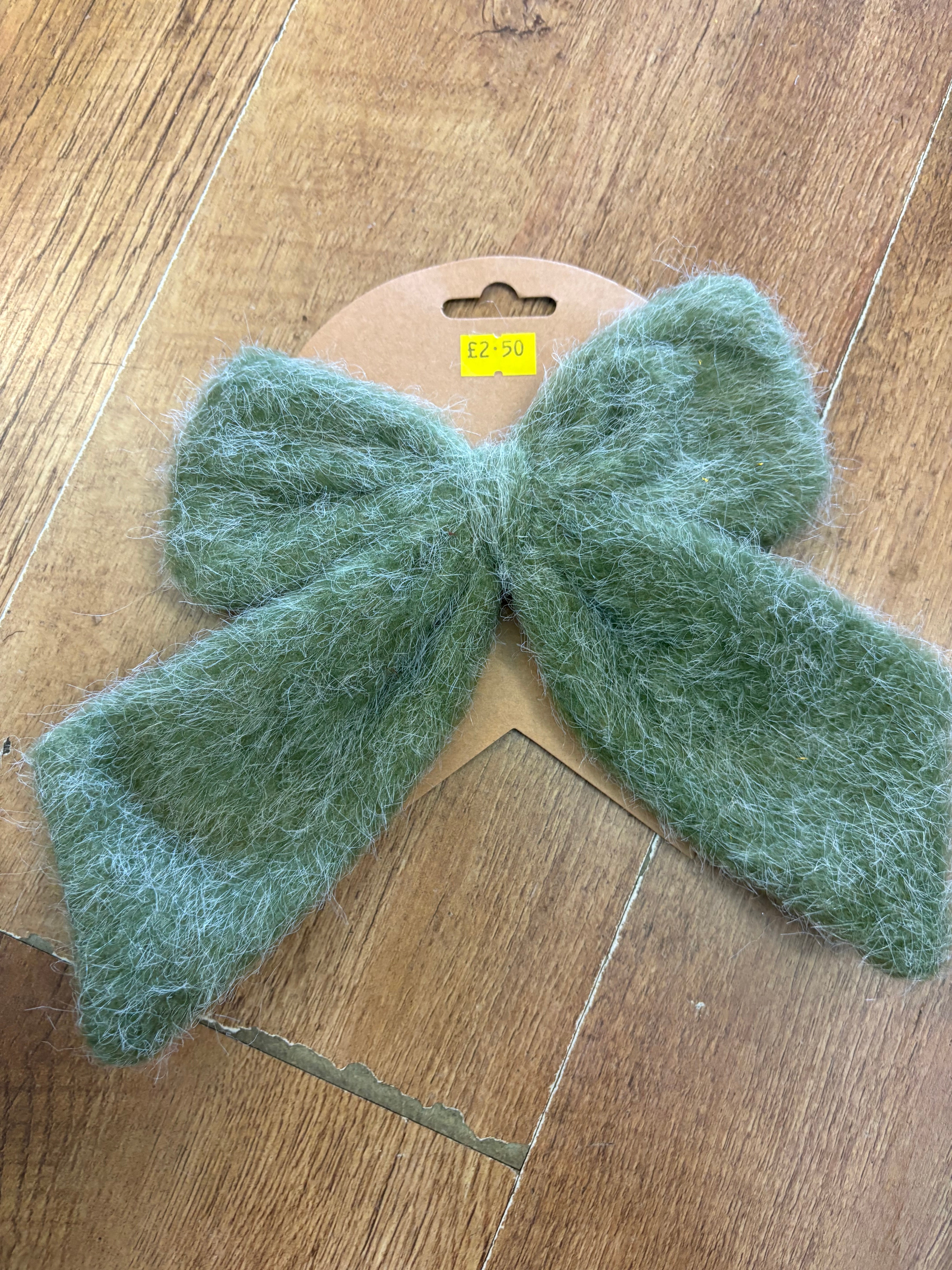 Small green fleece Christmas bow