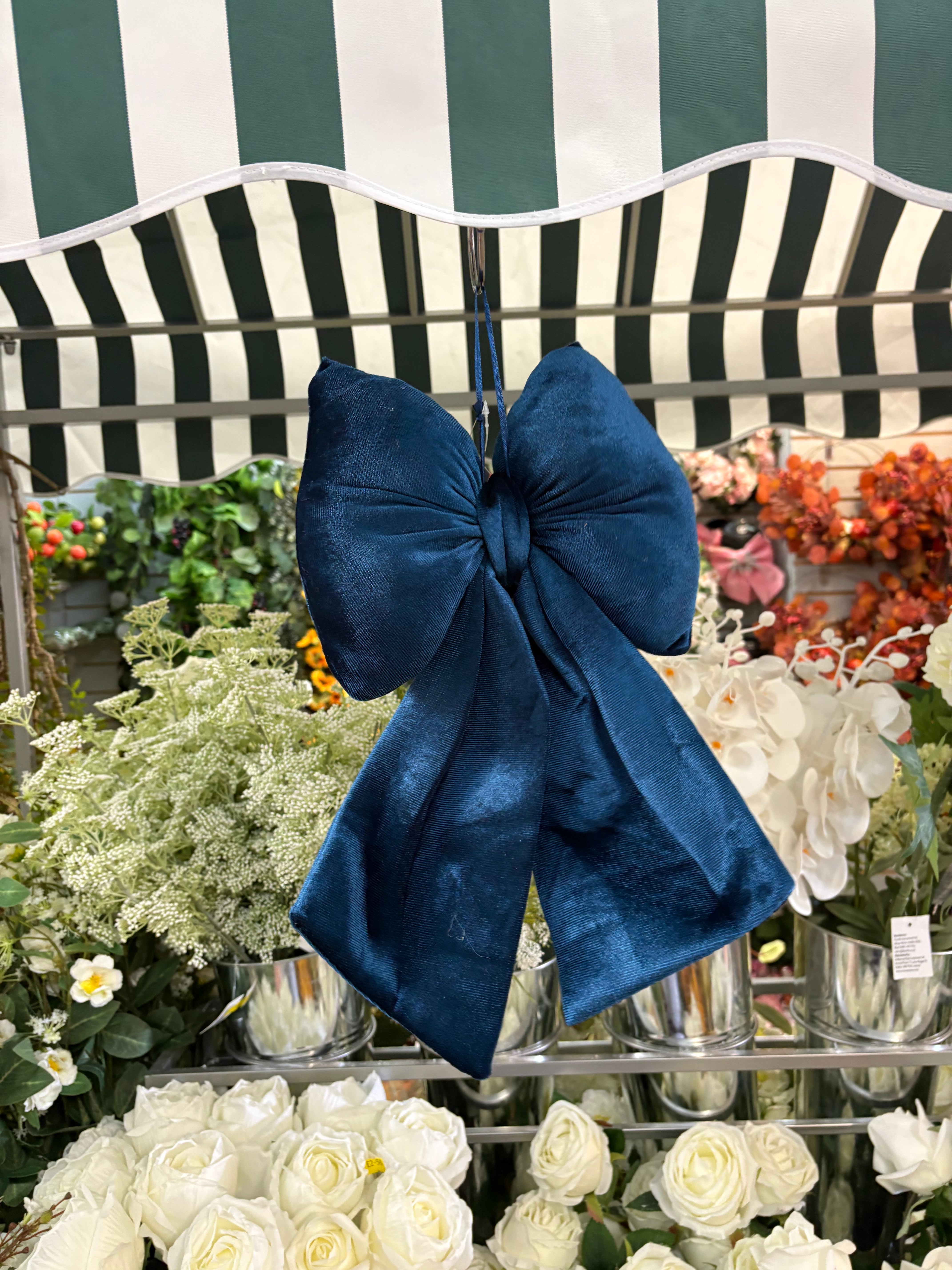 Small dark blue velvet Christmas bow