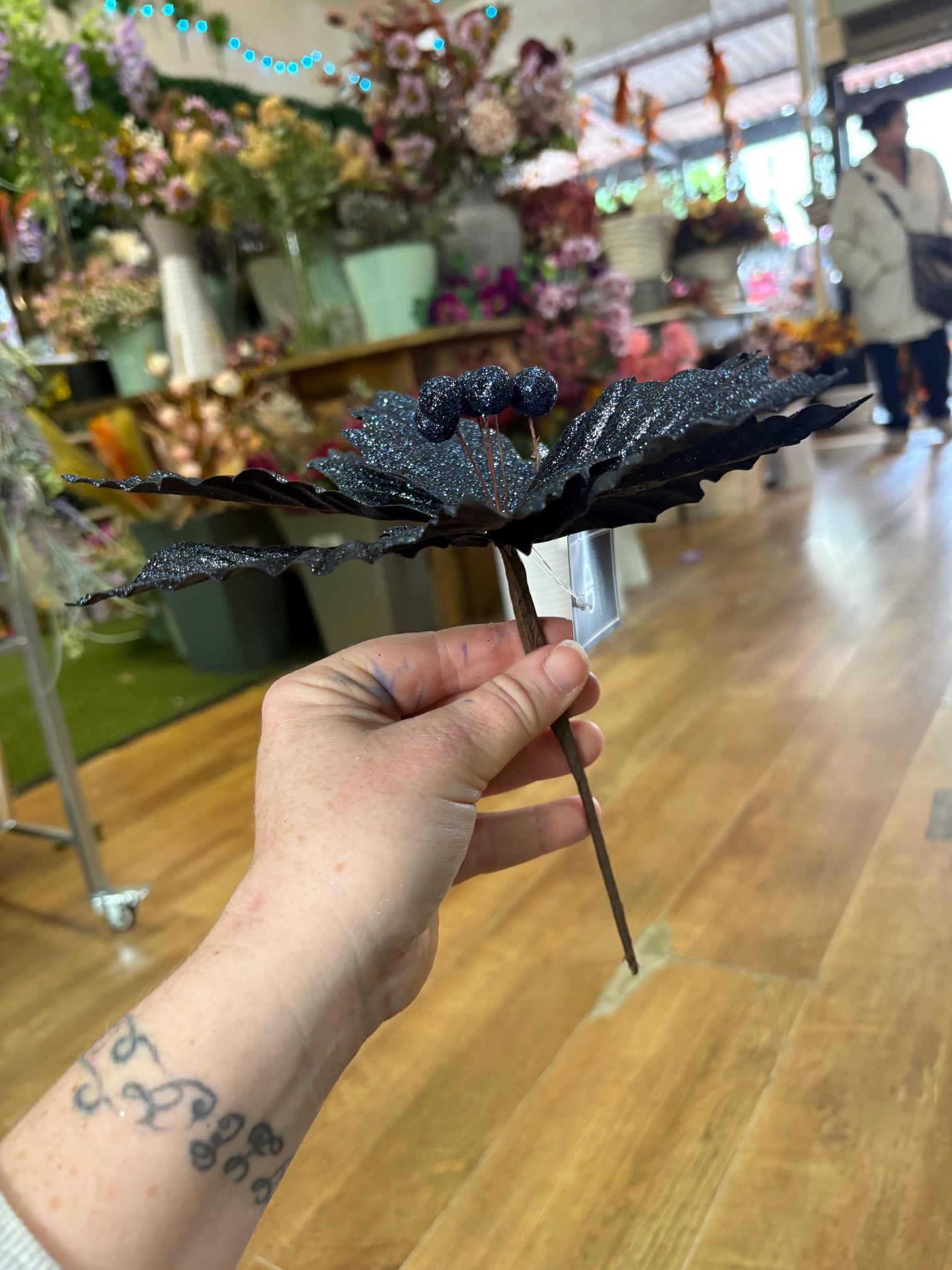 Glittered navy single poinsettia pick
