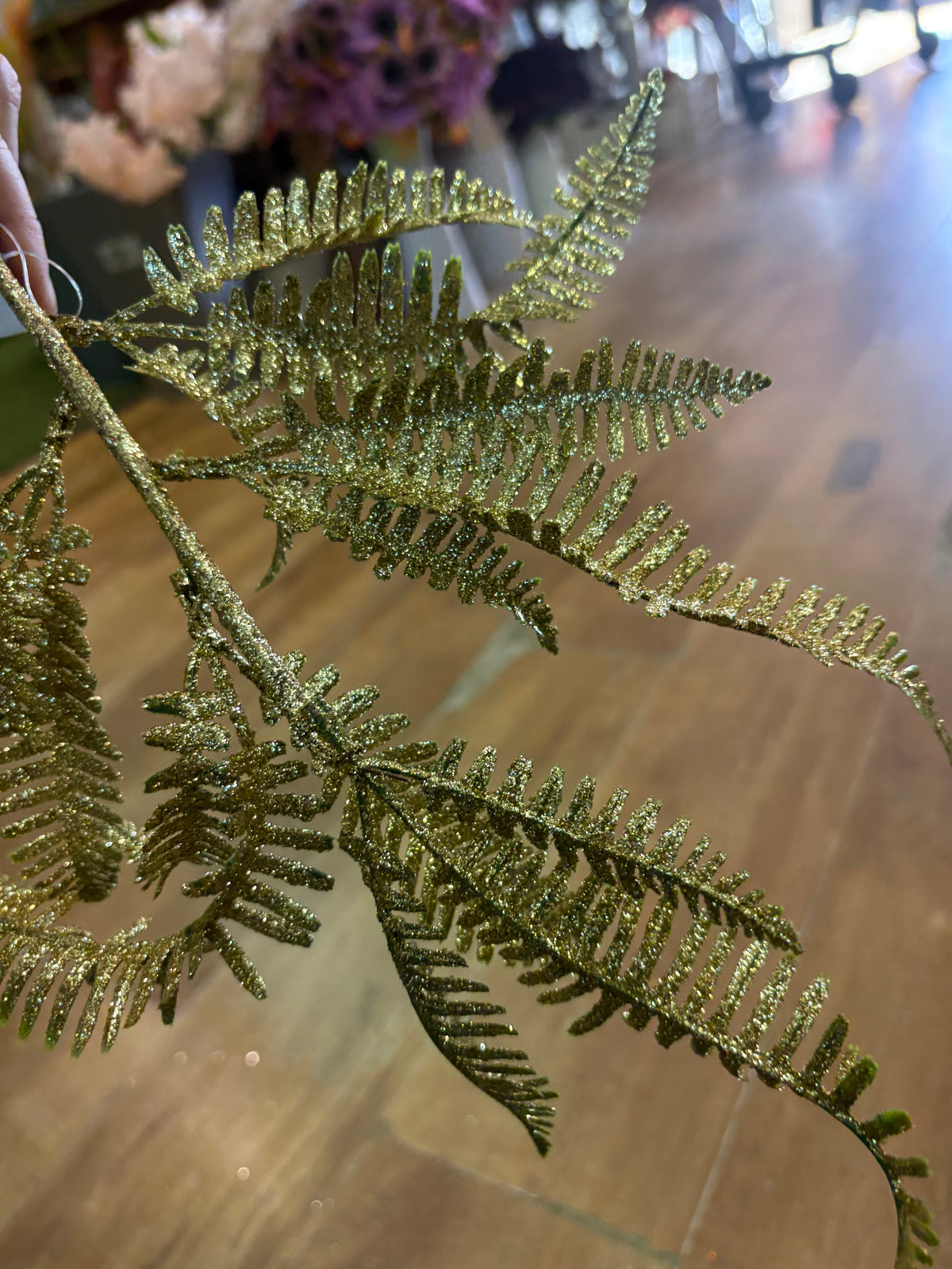 Gold glittered fern stem