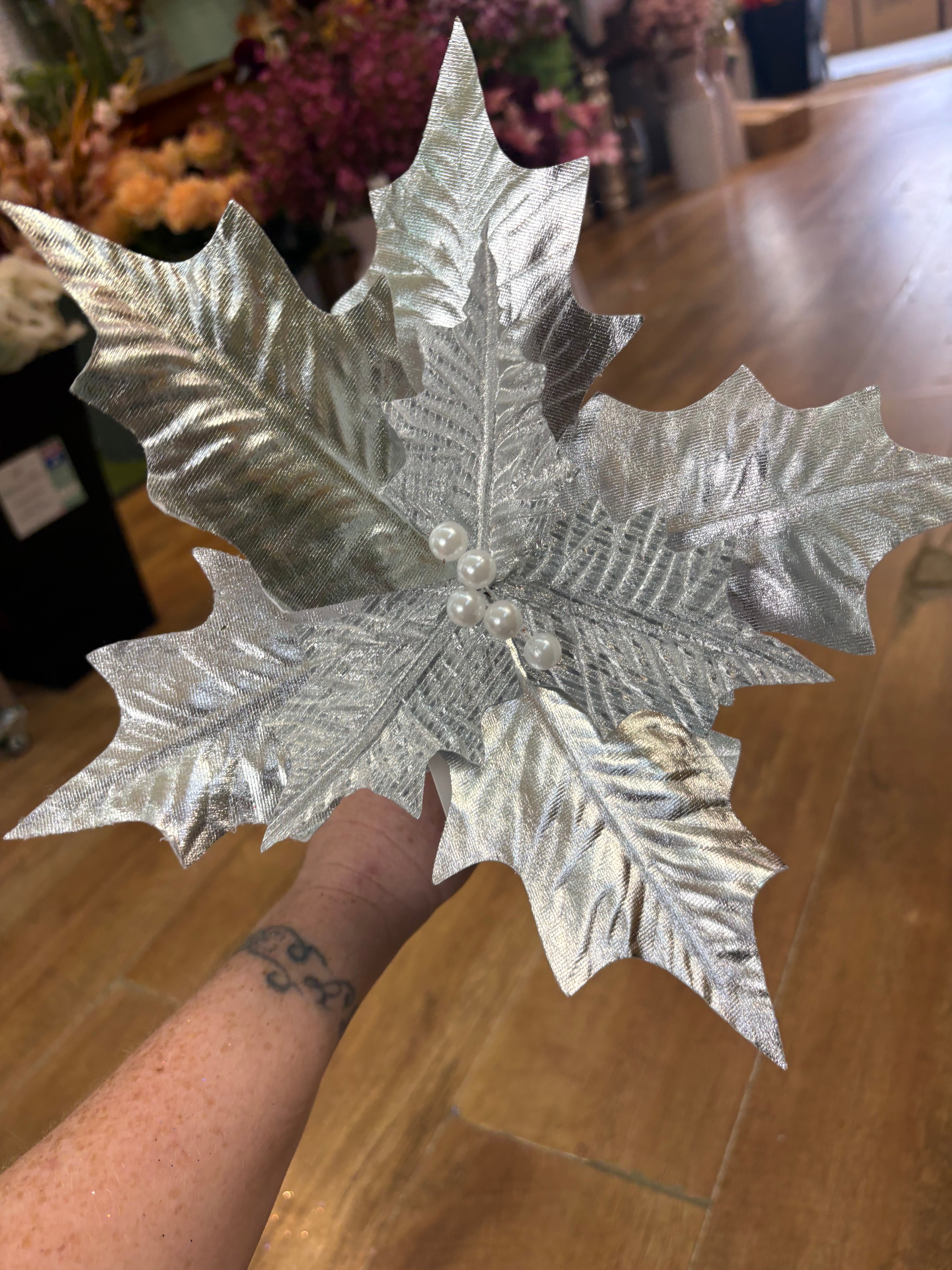 Single silver metallic and crinkle petal poinsettia