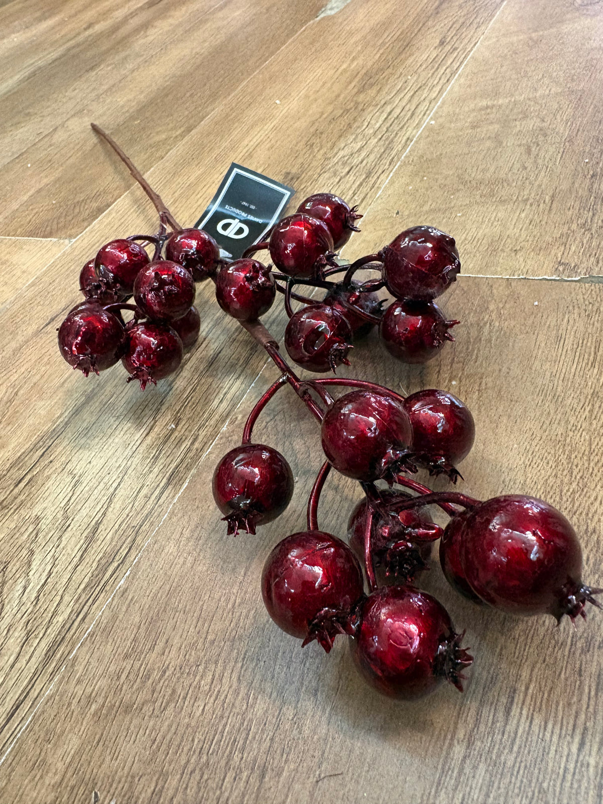 Long stem metallic burgundy rose hip spray