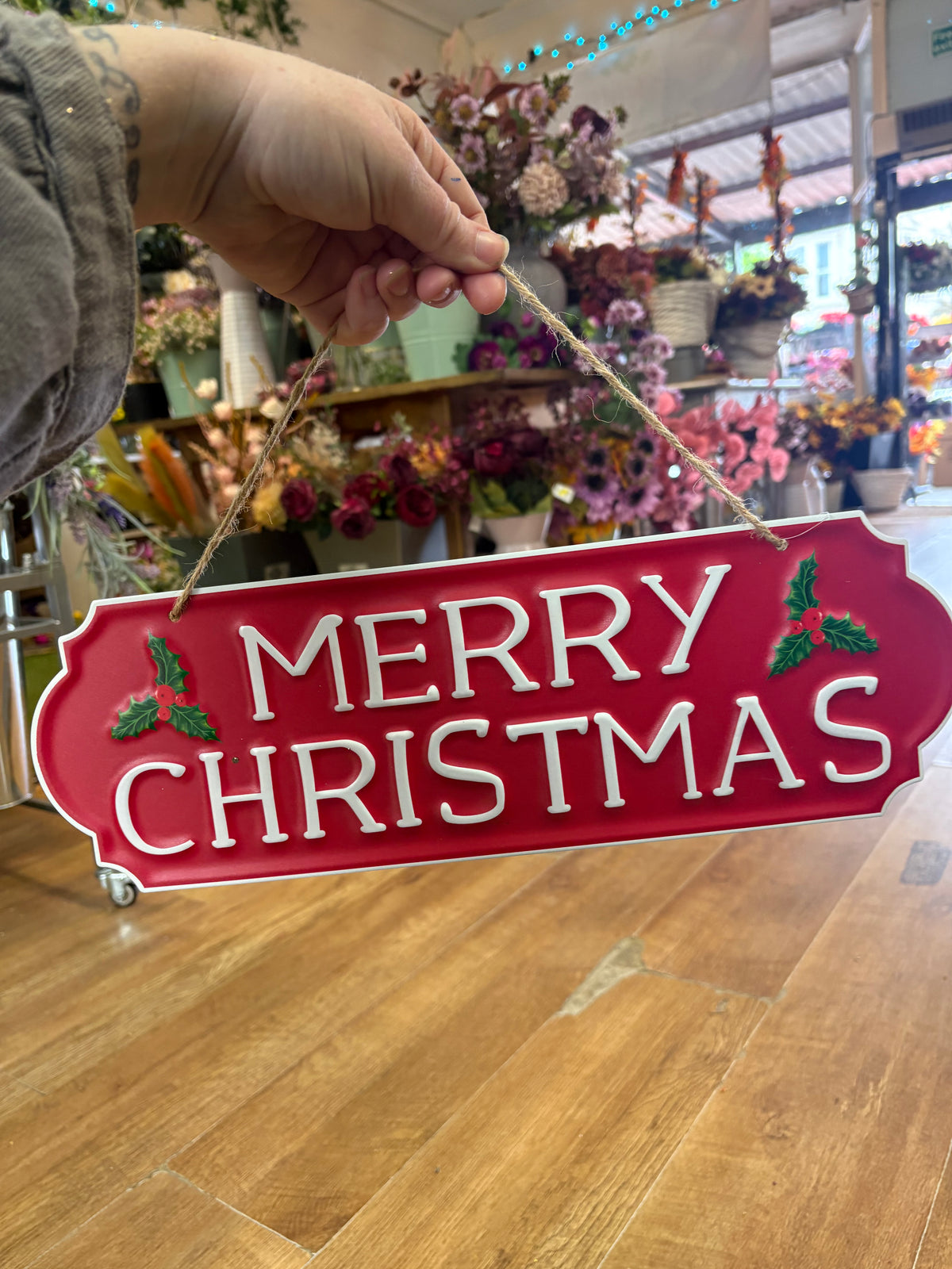 Hanging metal Merry Christmas sign