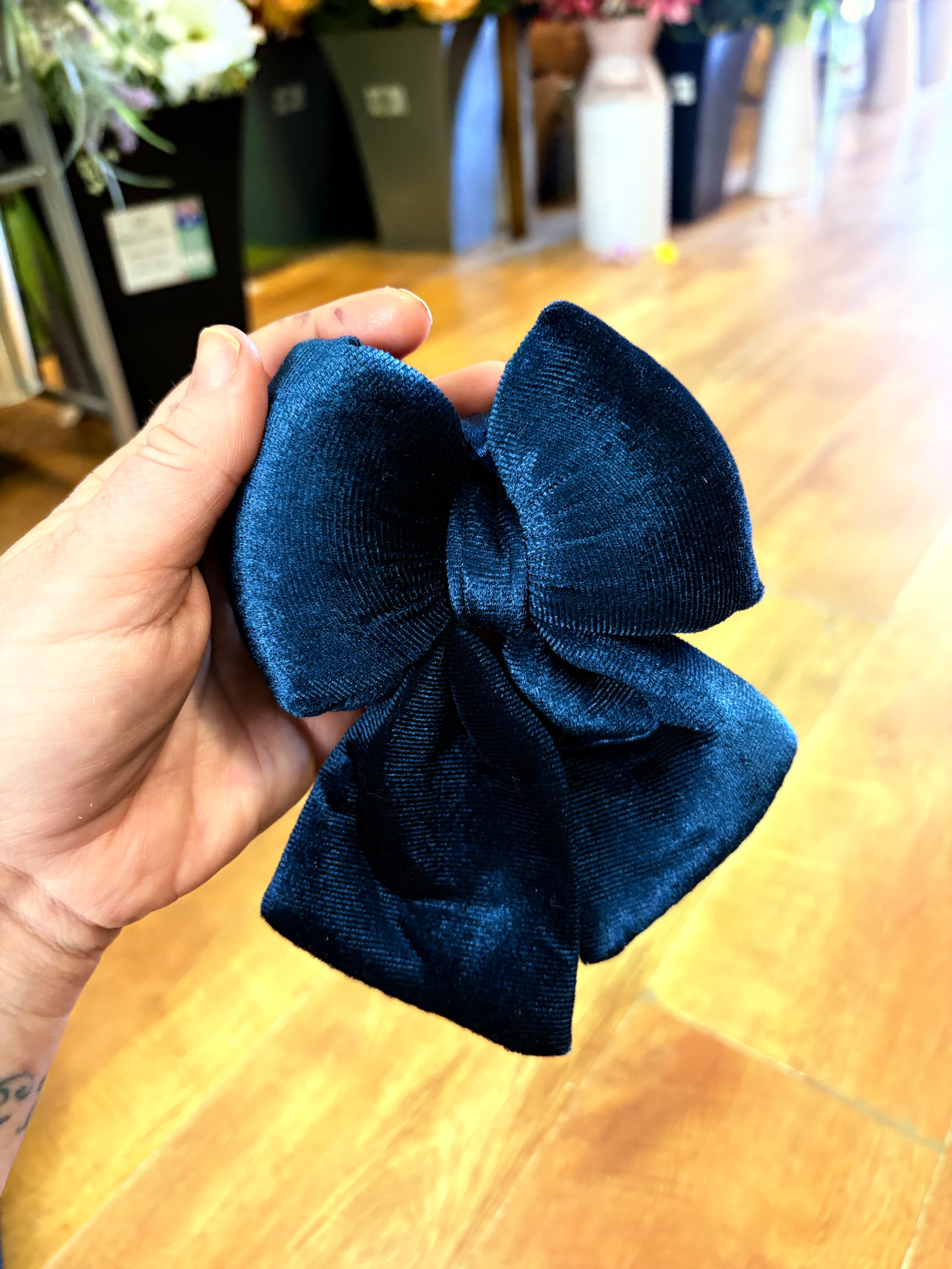 Tiny dark blue velvet Christmas bow