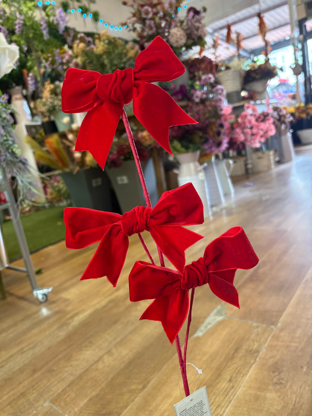 Red velvet bow spray