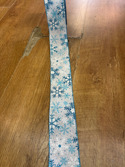 2.5 inch wide glittered blue and white snowflake wired ribbon - 10 metres