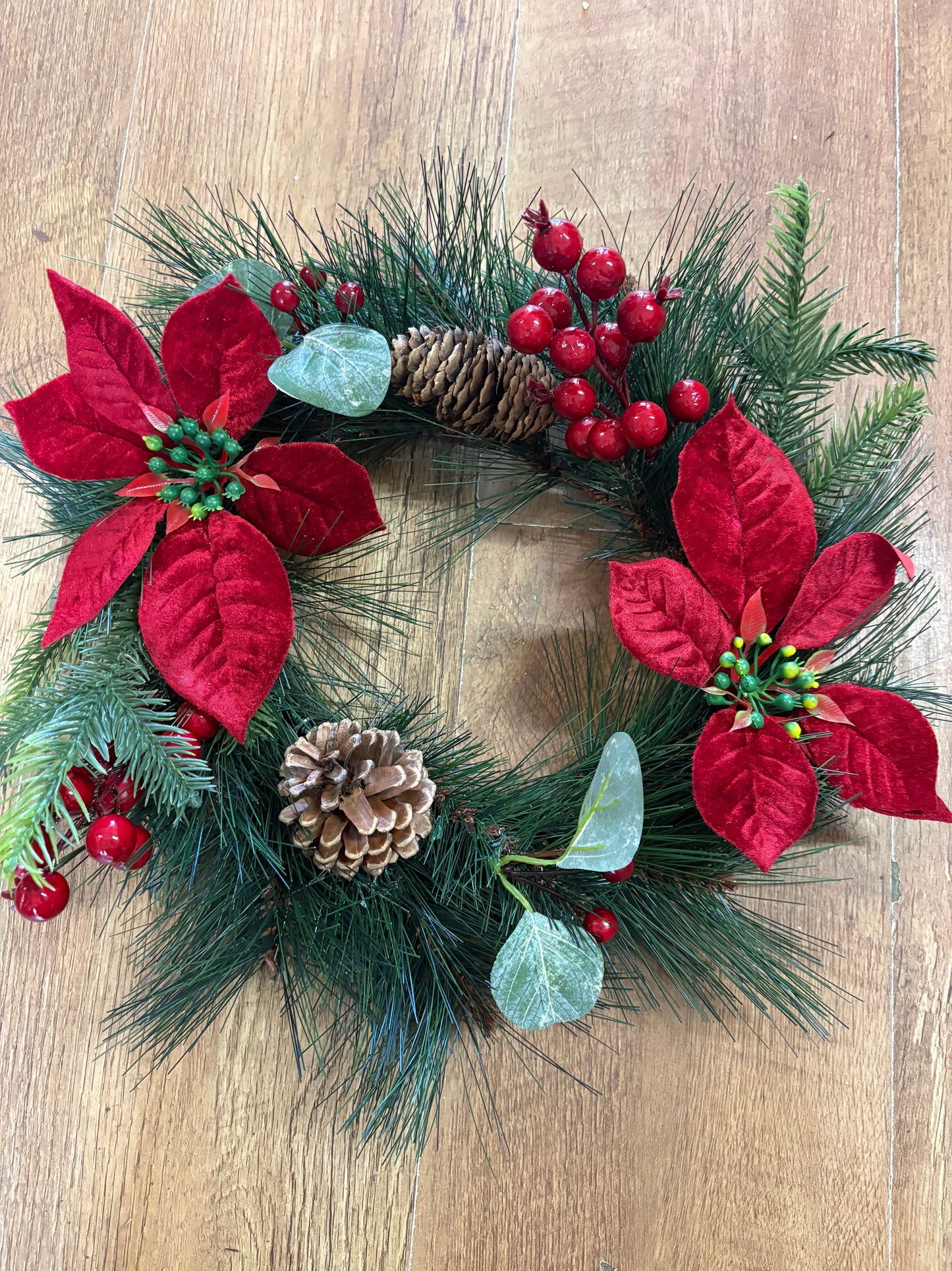Poinsettia and red berry wreath (40cm from tip to tip)