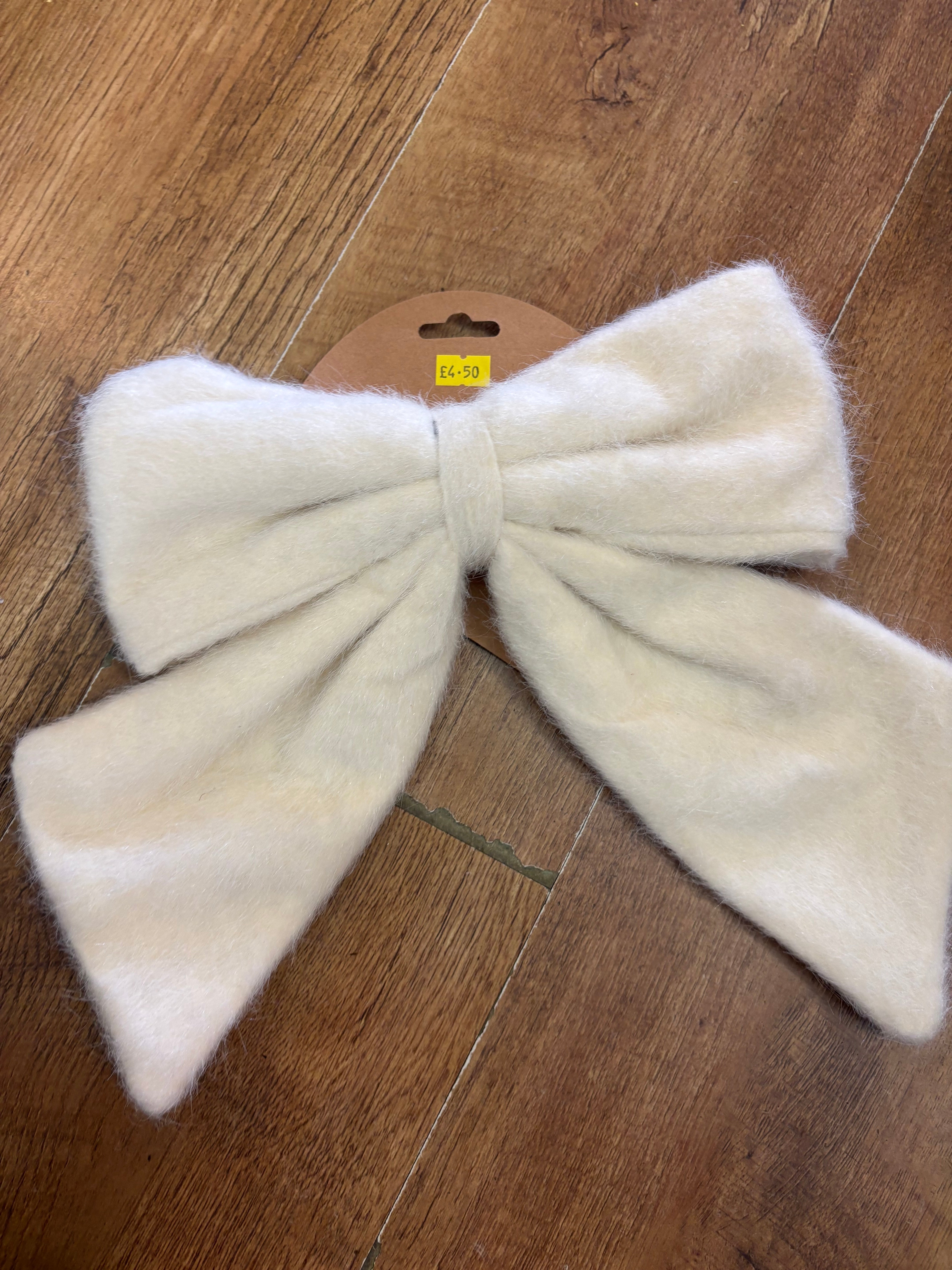 Medium cream fleece Christmas bow