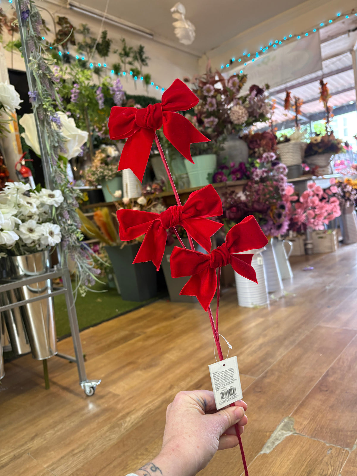 Red velvet bow spray