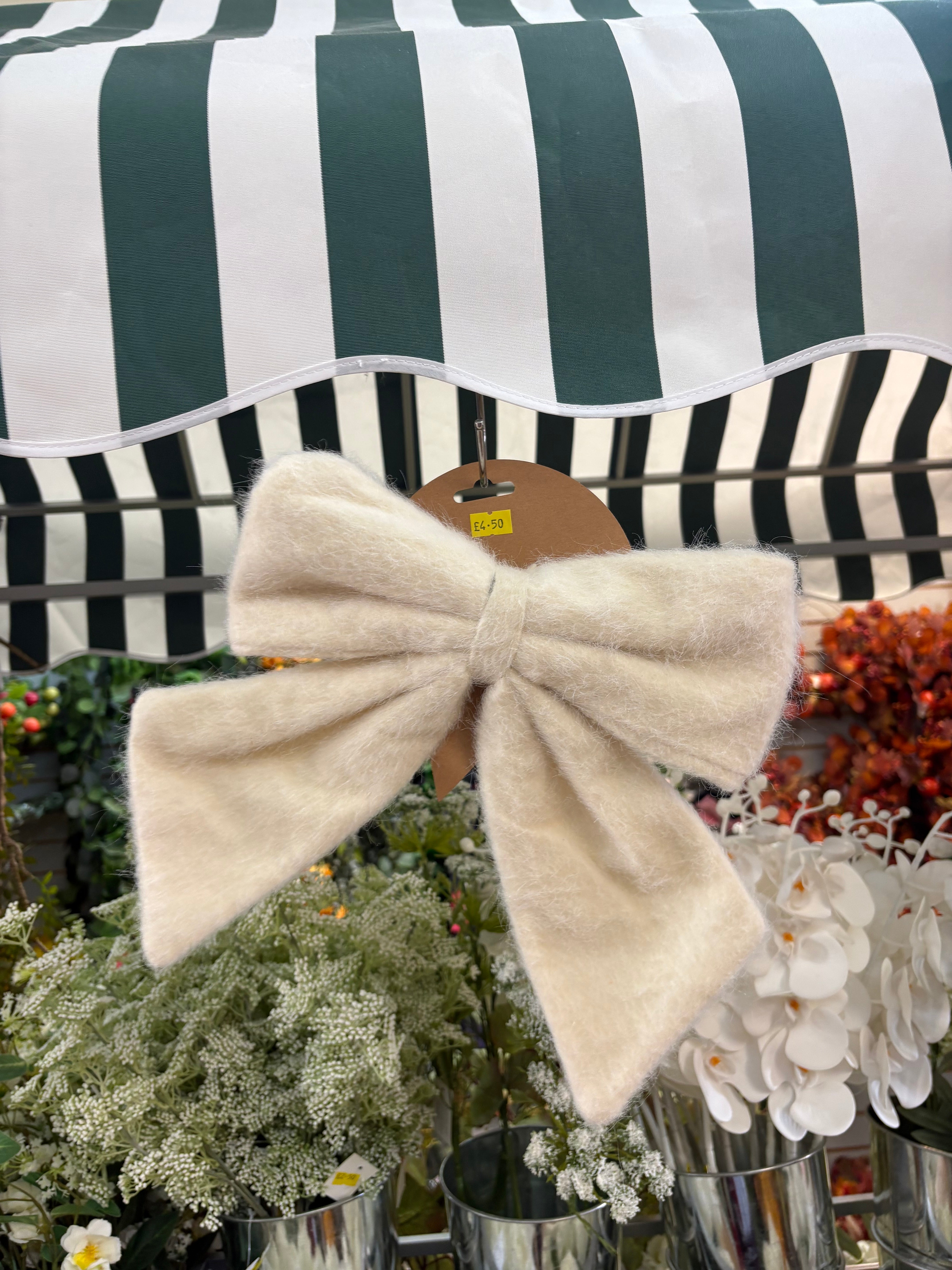 Medium cream fleece Christmas bow