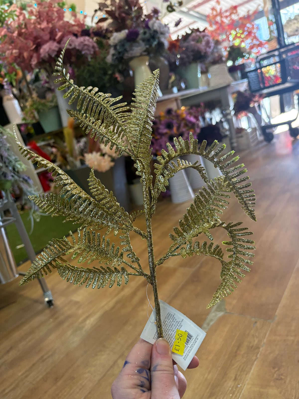 Gold glittered fern stem