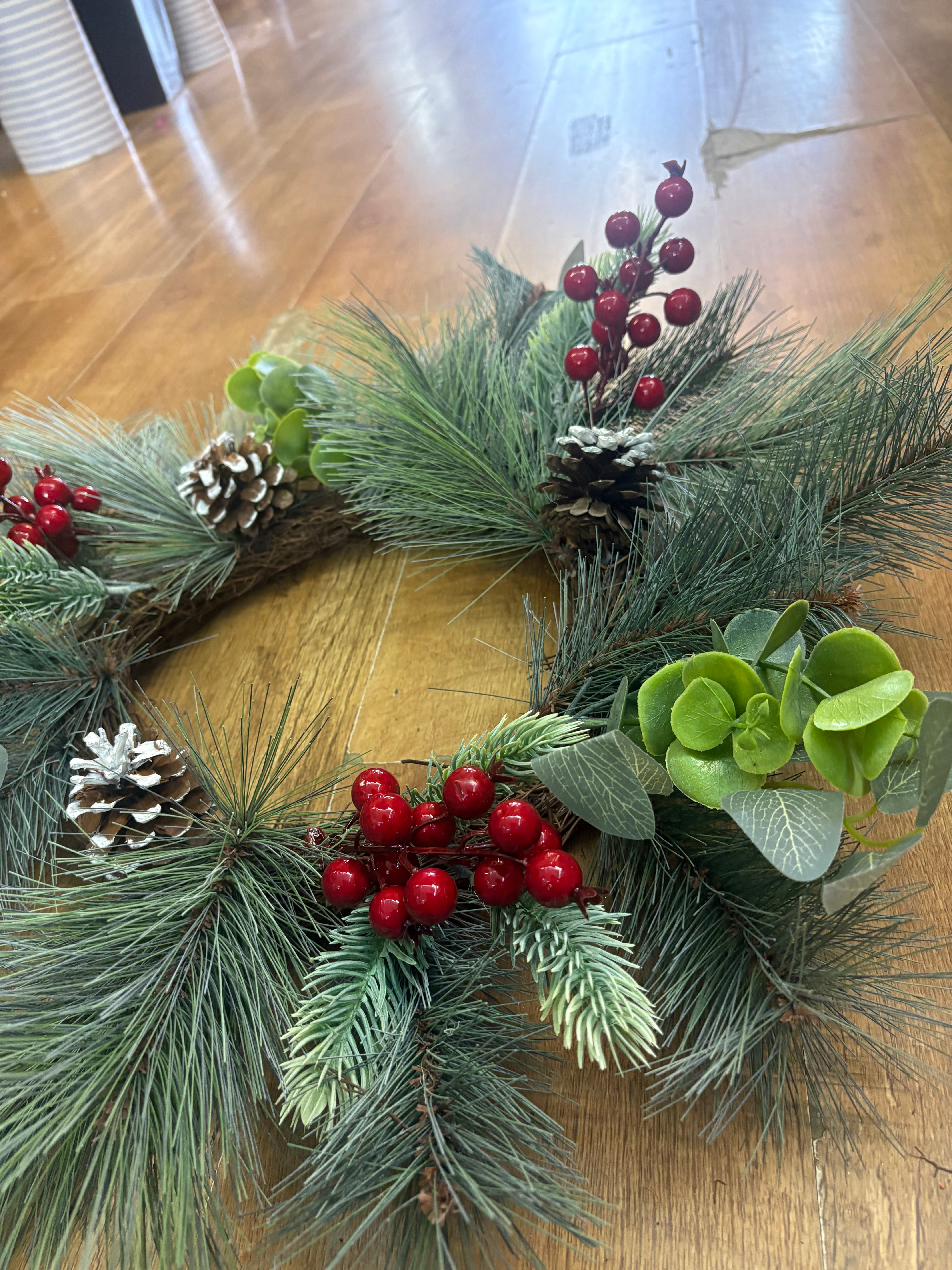 50cm frosted cone and berry wreath (measured tip to tip)